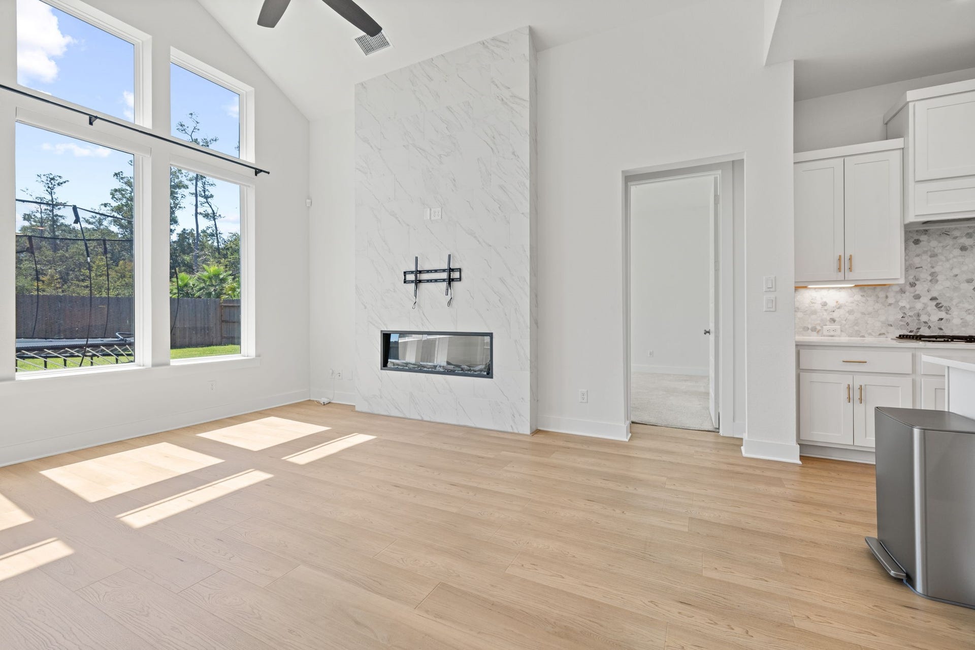 9211 Fury Landing Lane, Tomball, TX 77375 Spacious family room connects to the kitchen and dining