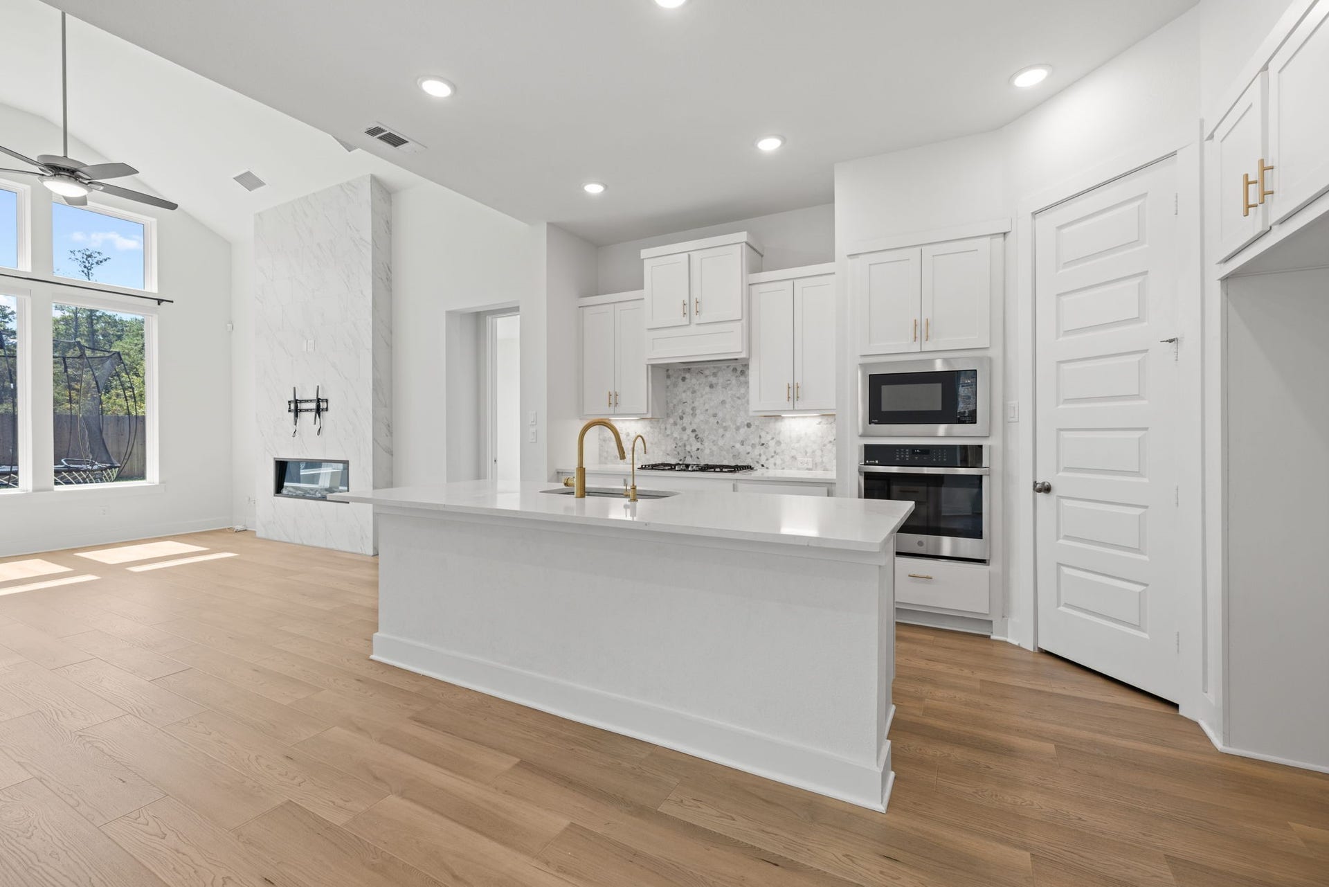 9211 Fury Landing Lane, Tomball, TX 77375 Chefs kitchen is the center of this open family area