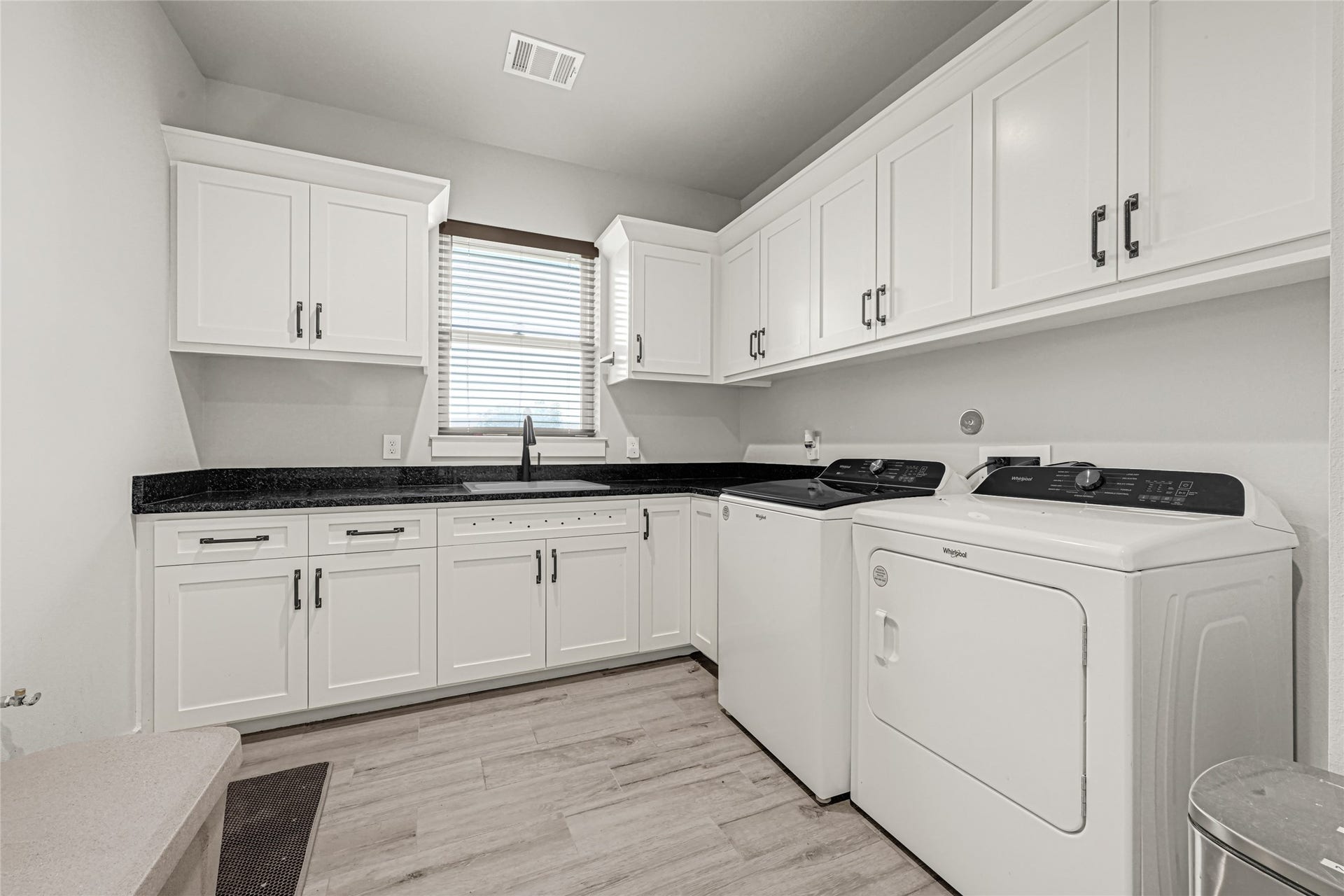 3325 County Road 160, Alvin, TX 77511 oversized laundry with sink and lots of extra storage. Pre-plummed for pet wash