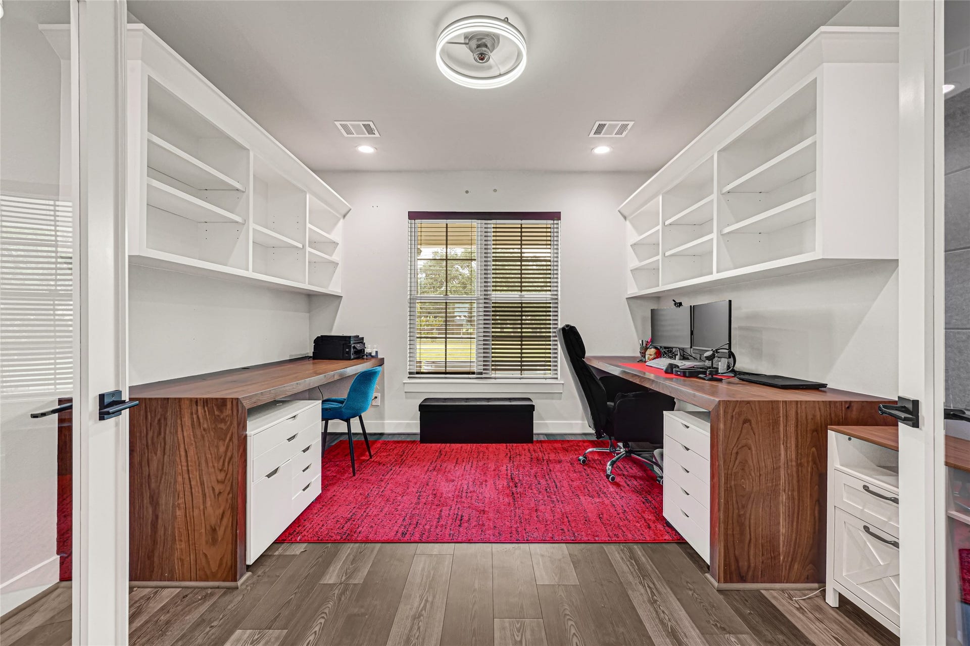 3325 County Road 160, Alvin, TX 77511 Home office with glass french doors, 2 built in 3x8 Walnut desks and upper shelving