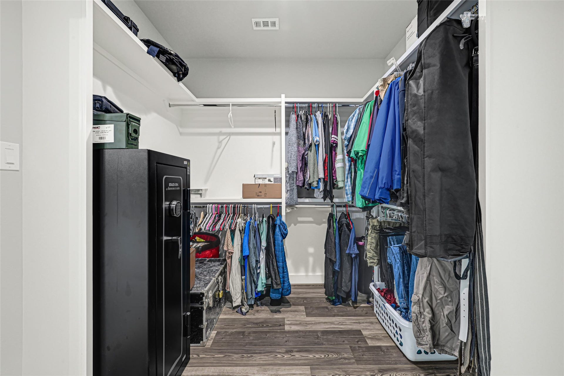 3325 County Road 160, Alvin, TX 77511 Large primary closet with access to laundry room, and doubles as a safe room