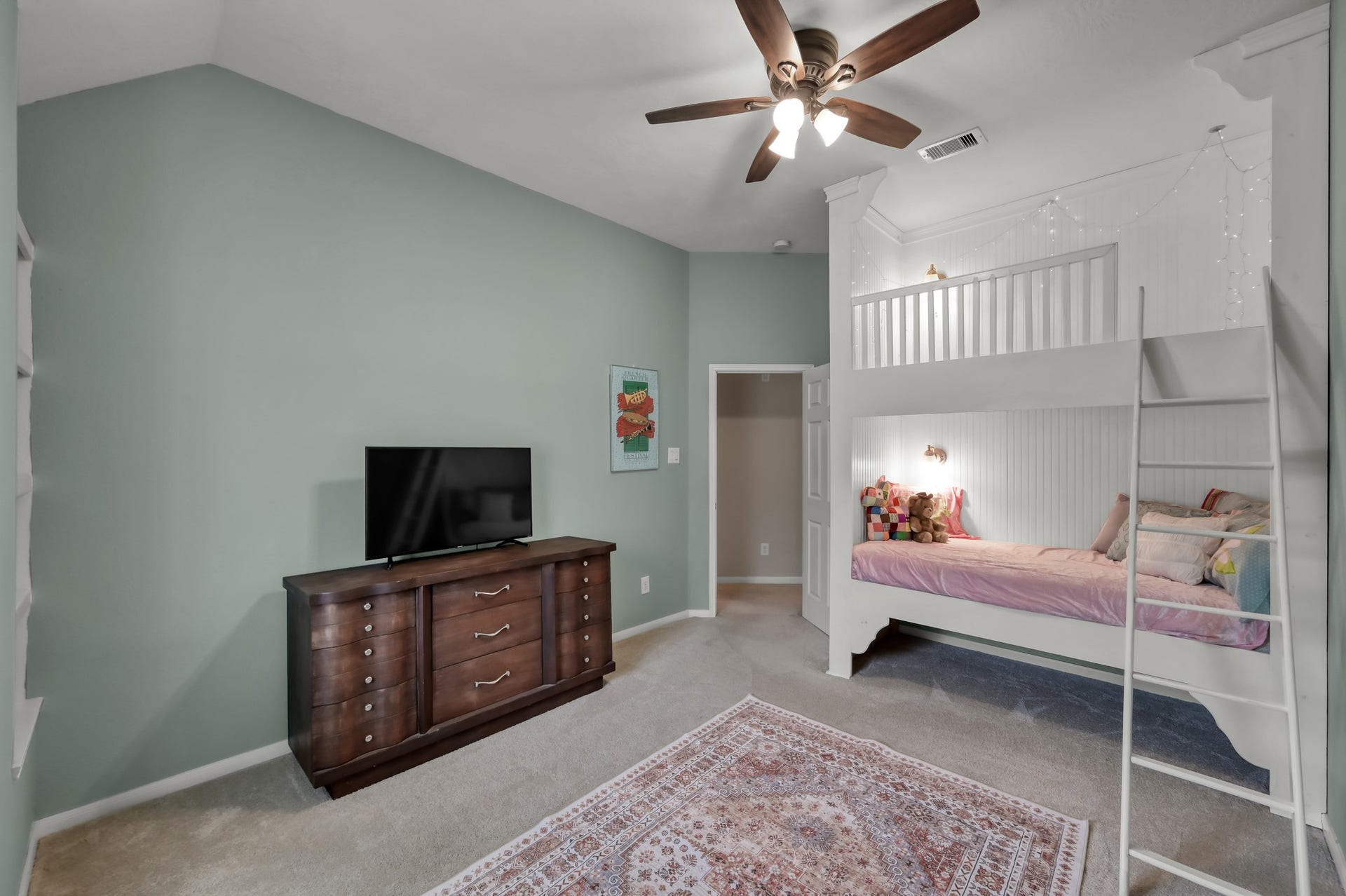 2502 Wynden Meadow Lane, Conroe, TX 77304 Charming bedroom with custom built-in bunk space, soft designer colors, and an open layout that makes the room both fun and functional.