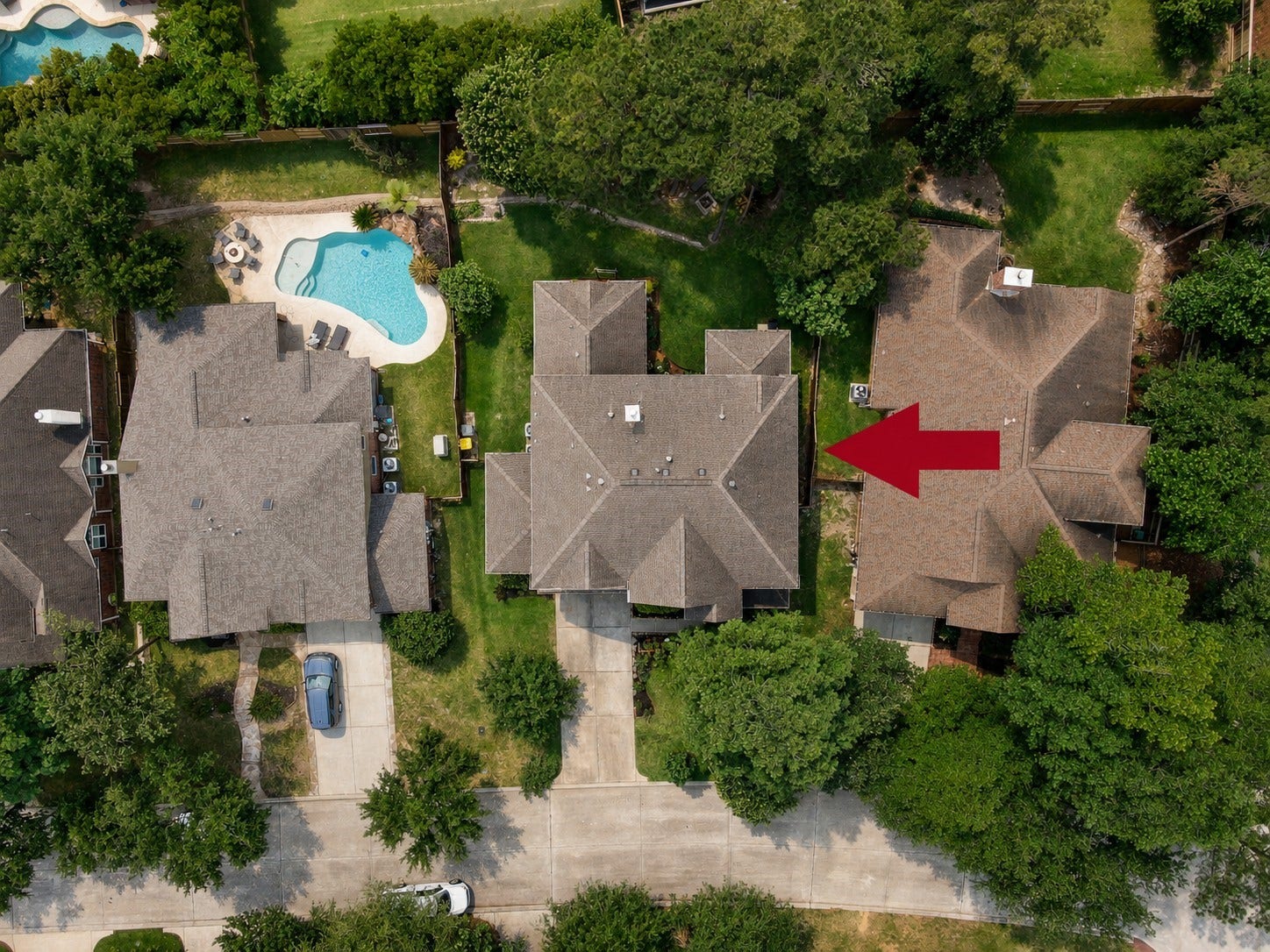 2502 Wynden Meadow Lane, Conroe, TX 77304 This aerial perspective showcases the homes ideal location within the neighborhood, generous outdoor space, and easy access to nearby amenities while still offering a peaceful residential feel.