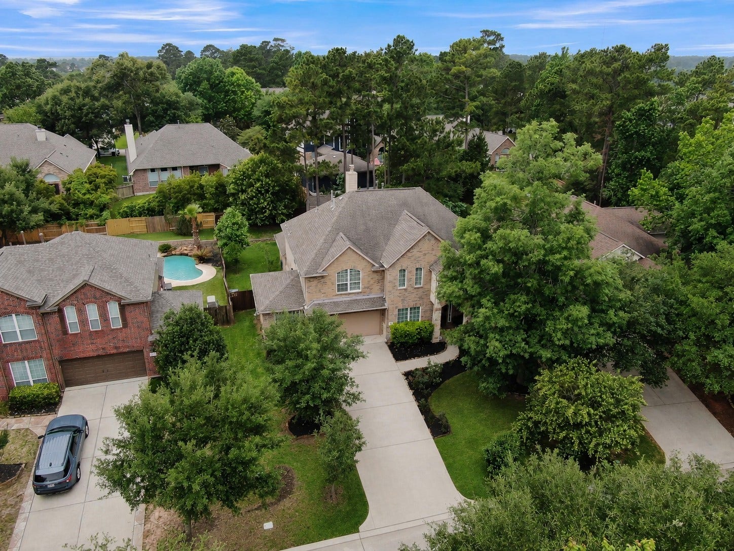 2502 Wynden Meadow Lane, Conroe, TX 77304 Beautifully situated on a quiet, tree-lined street with mature landscaping and a spacious lot. This home offers a peaceful setting with a private backyard retreat while still being close to shopping, dining, parks, and everyday conveniences.