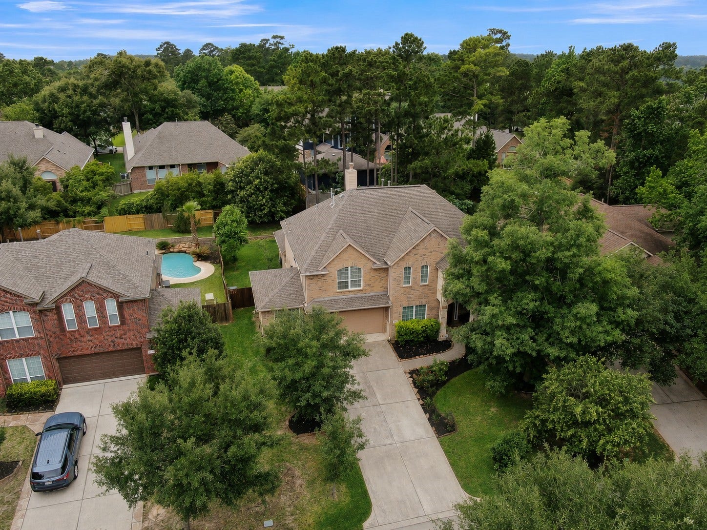 2502 Wynden Meadow Lane, Conroe, TX 77304 Enjoy attractive curb appeal, a long driveway, lush landscaping, and a private backyard setting with plenty of green space. Conveniently located near shopping, dining, parks, and top-rated schools while still offering a peaceful, tucked-away feel.