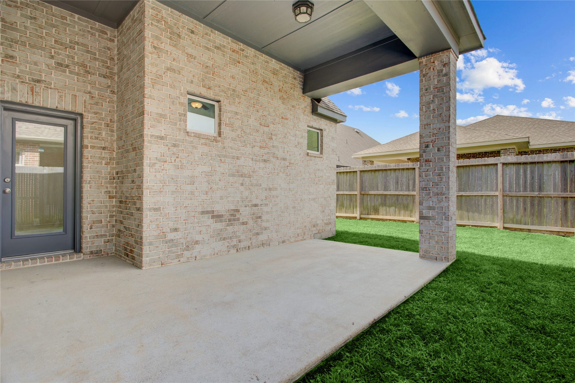 3423 Tranquil Harvest Trail, Richmond, TX 77406 Another angle of the back covered patio.