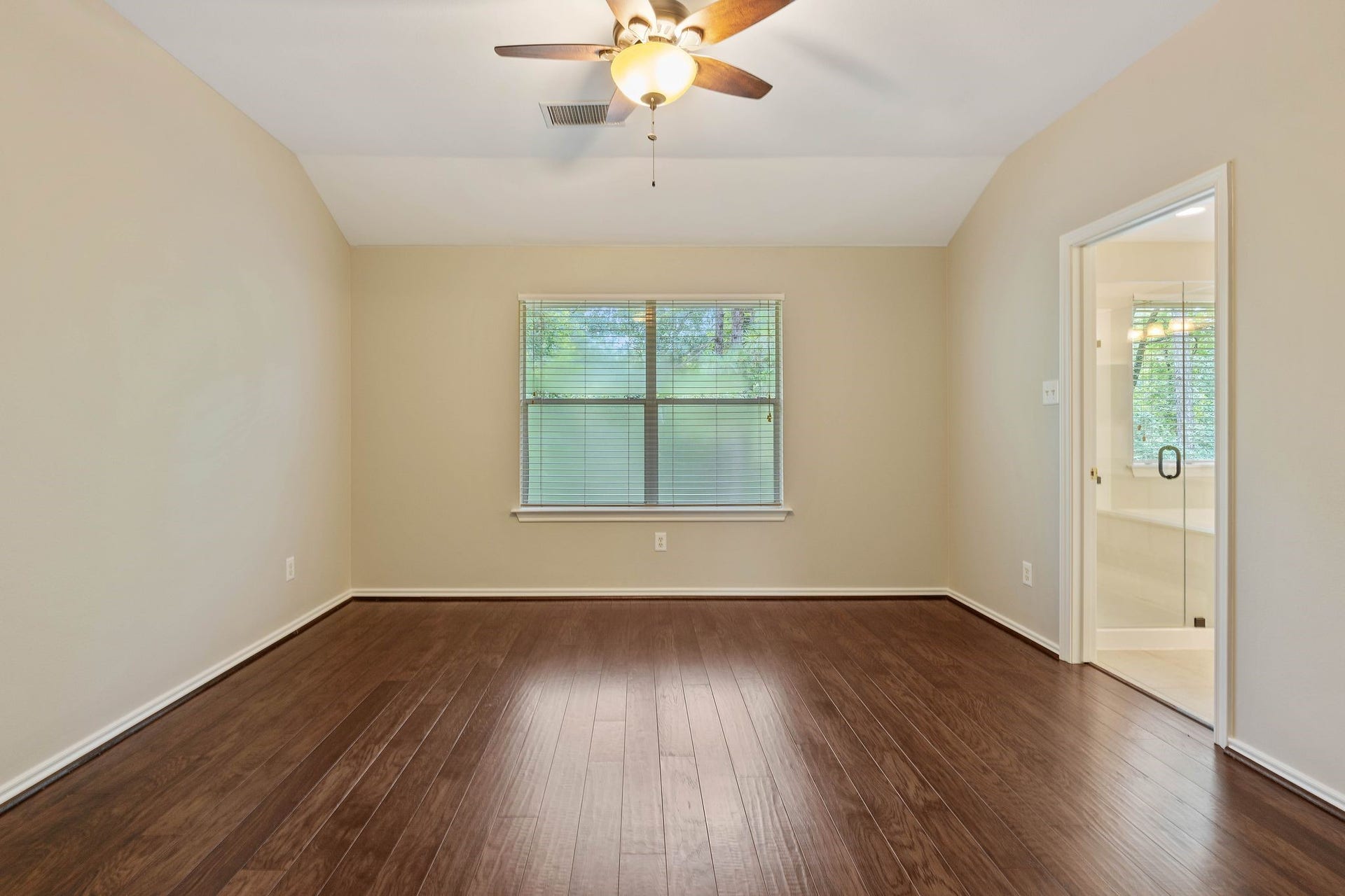 50 Leafstalk Court, The Woodlands, TX 77382 second floor master bedroom with gleaming wood floors