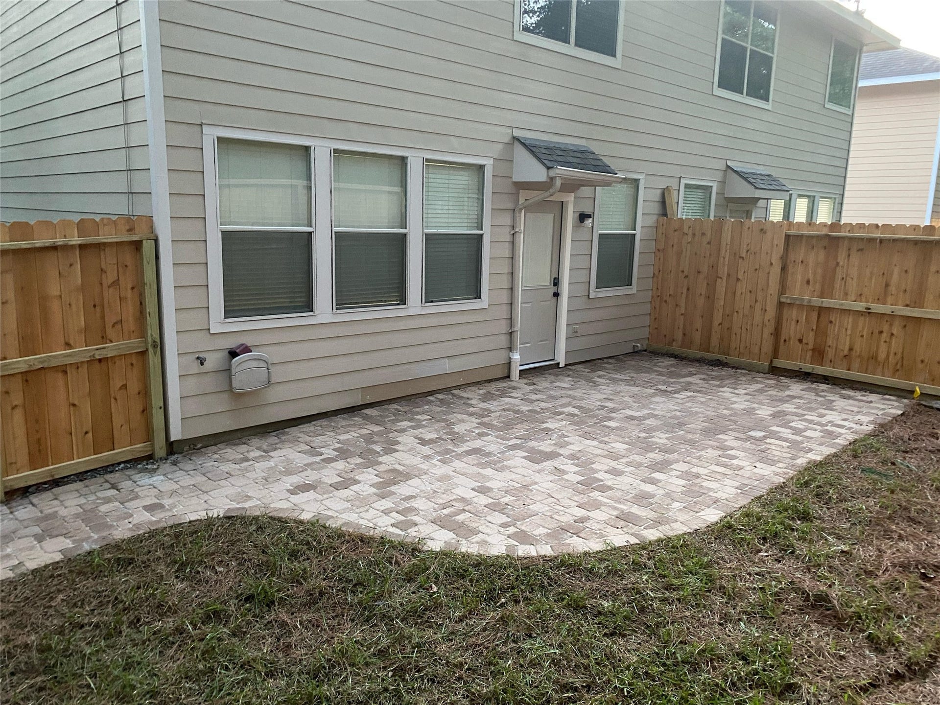 50 Leafstalk Court, The Woodlands, TX 77382 backyard has been upgraded with pavers and a brand new fence. backs to greenbelt for total privacy.