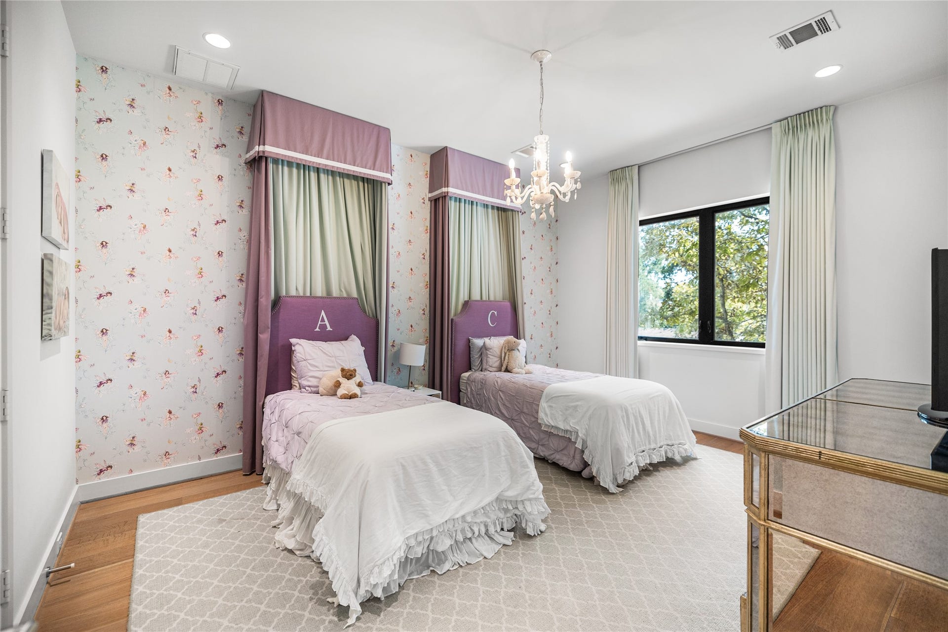 2608 Barbara Lane, Houston, TX 77005 Among three secondary bedrooms upstairs, this room offers a welcome sense of calm. Foam insulation along the street-facing wall softens the outside world, preserving the stillness within.