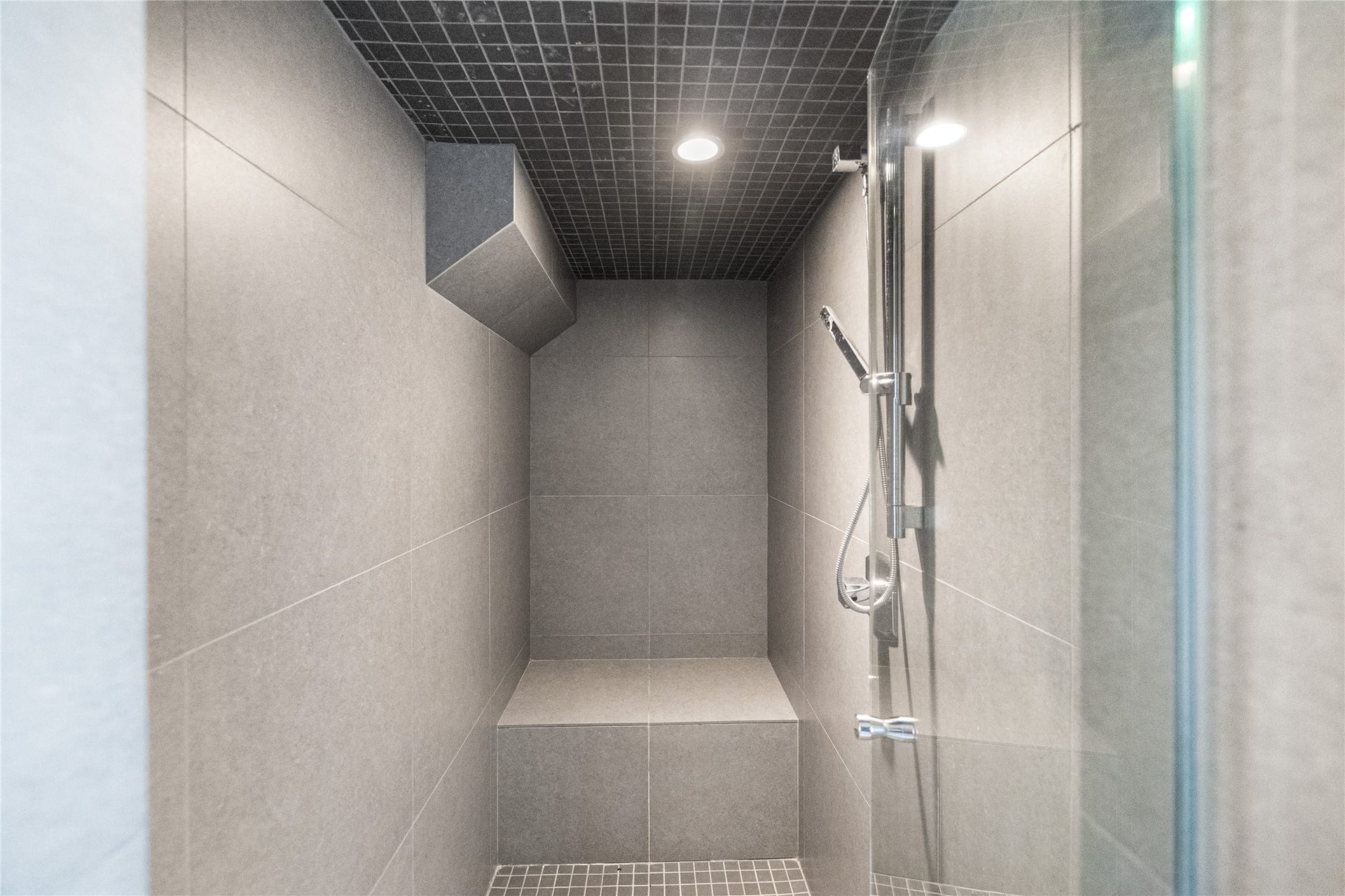 2608 Barbara Lane, Houston, TX 77005 This spacious walk-in shower is equally refined for overnight guests and also suited for poolside use.