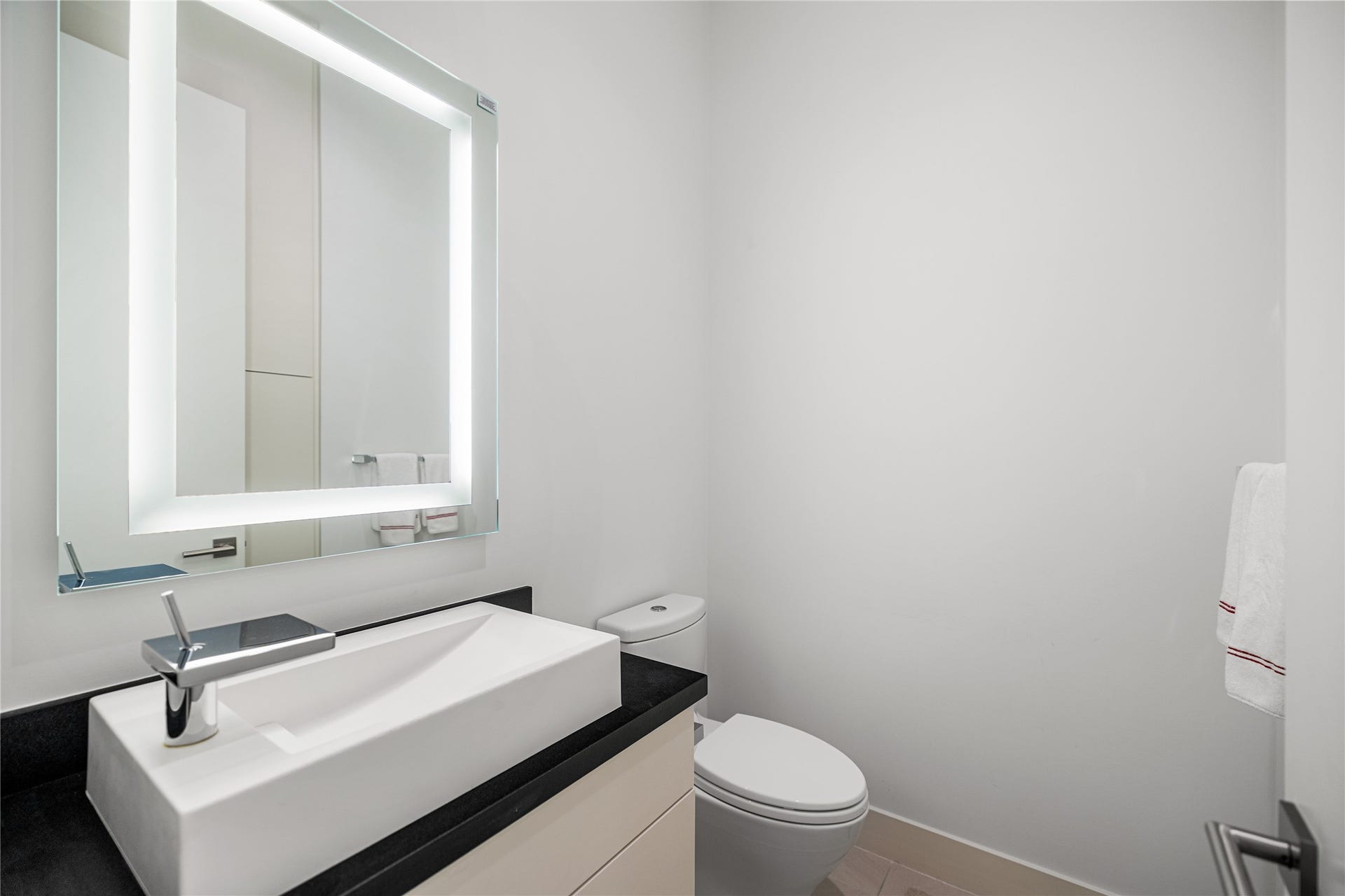 2608 Barbara Lane, Houston, TX 77005 A timeless powder bath is conveniently positioned off the second-floor hallway.
