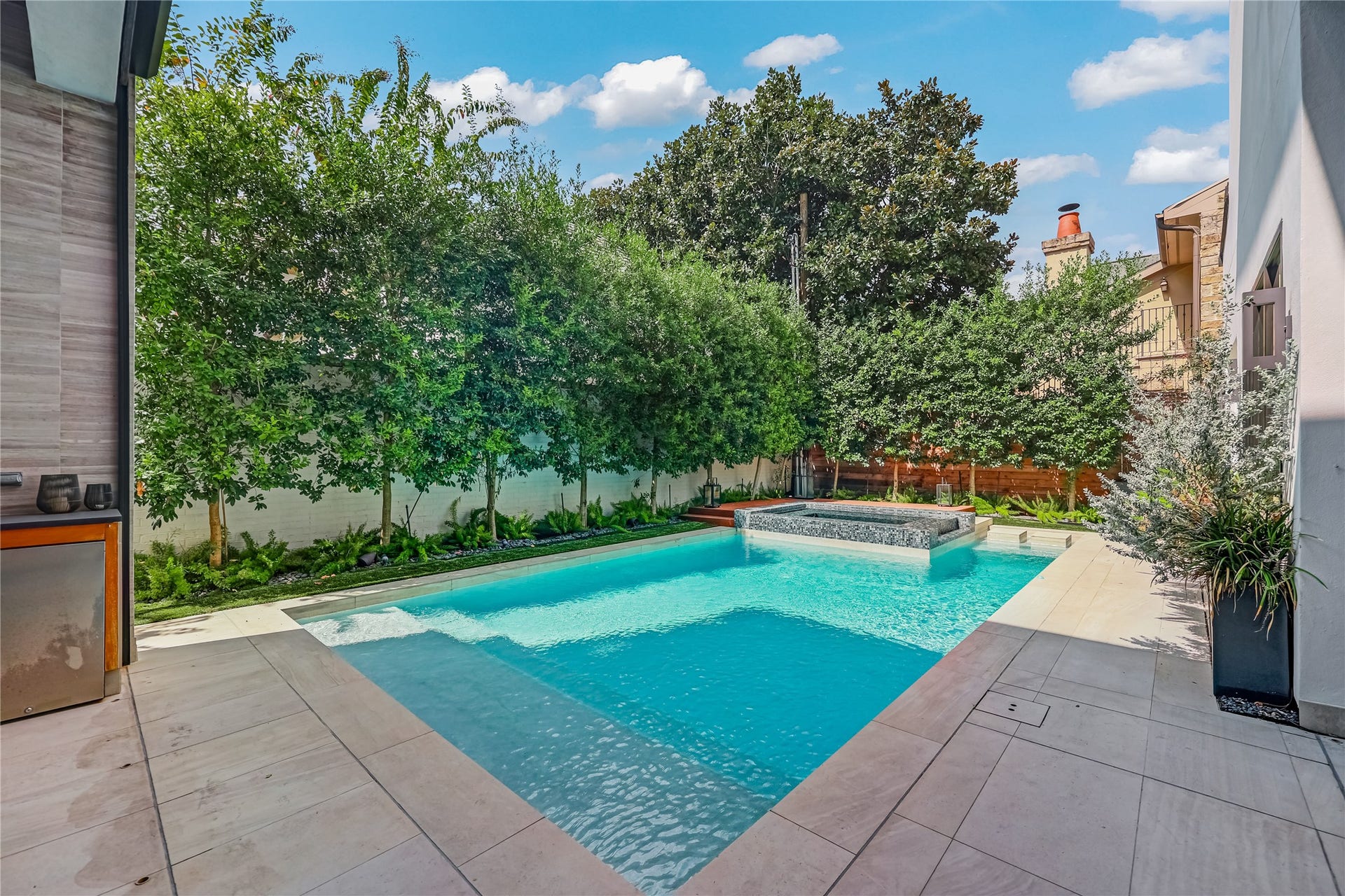 2608 Barbara Lane, Houston, TX 77005 Owners thoughtfully placed the electrical service underground, eliminating overhead lines and preserving the property's clean, uninterrupted architectural sightlines.