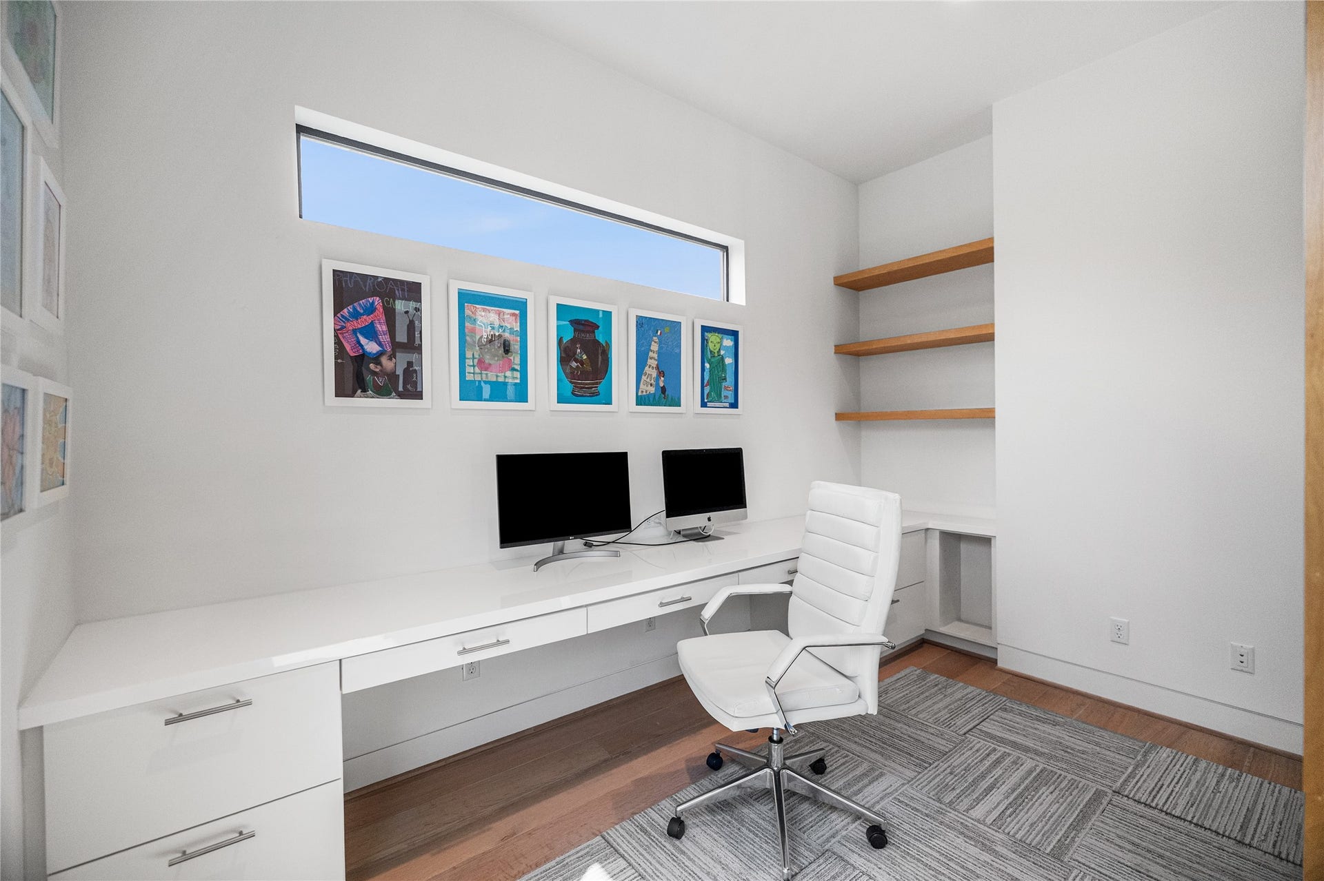 2608 Barbara Lane, Houston, TX 77005 Thoughtfully positioned just outside the primary suite, this home office with a built-in desk and storage brings modern function to the upstairs living. It is a refined, dedicated space for remote work by day and homework by evening. A sculptural wood feature wall artfully defines this space, creating a sense of privacy while adding warmth and architectural character.