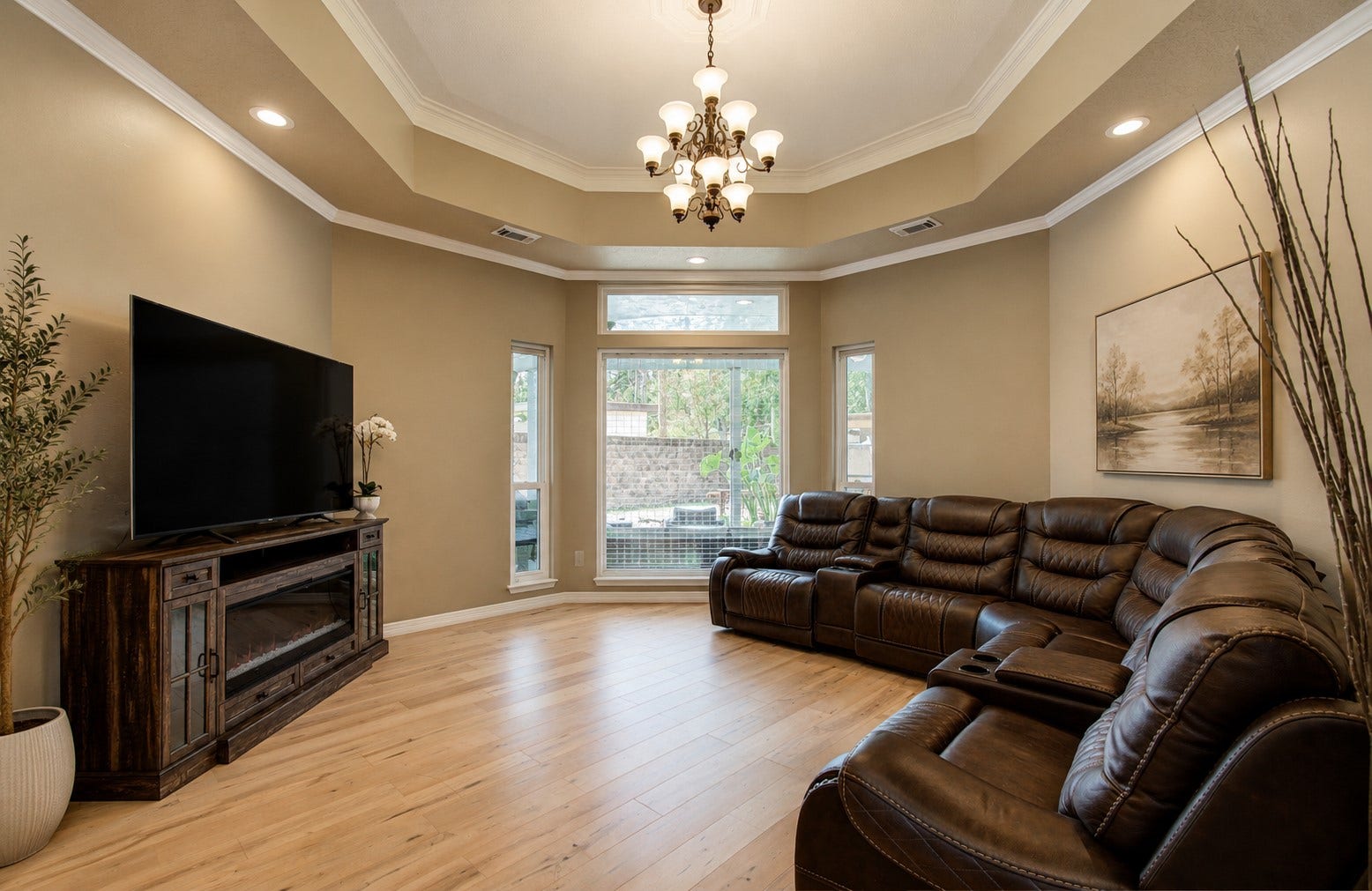 As you step down from the foyer you will be greeted by this beautiful hexagon shaped formal living room