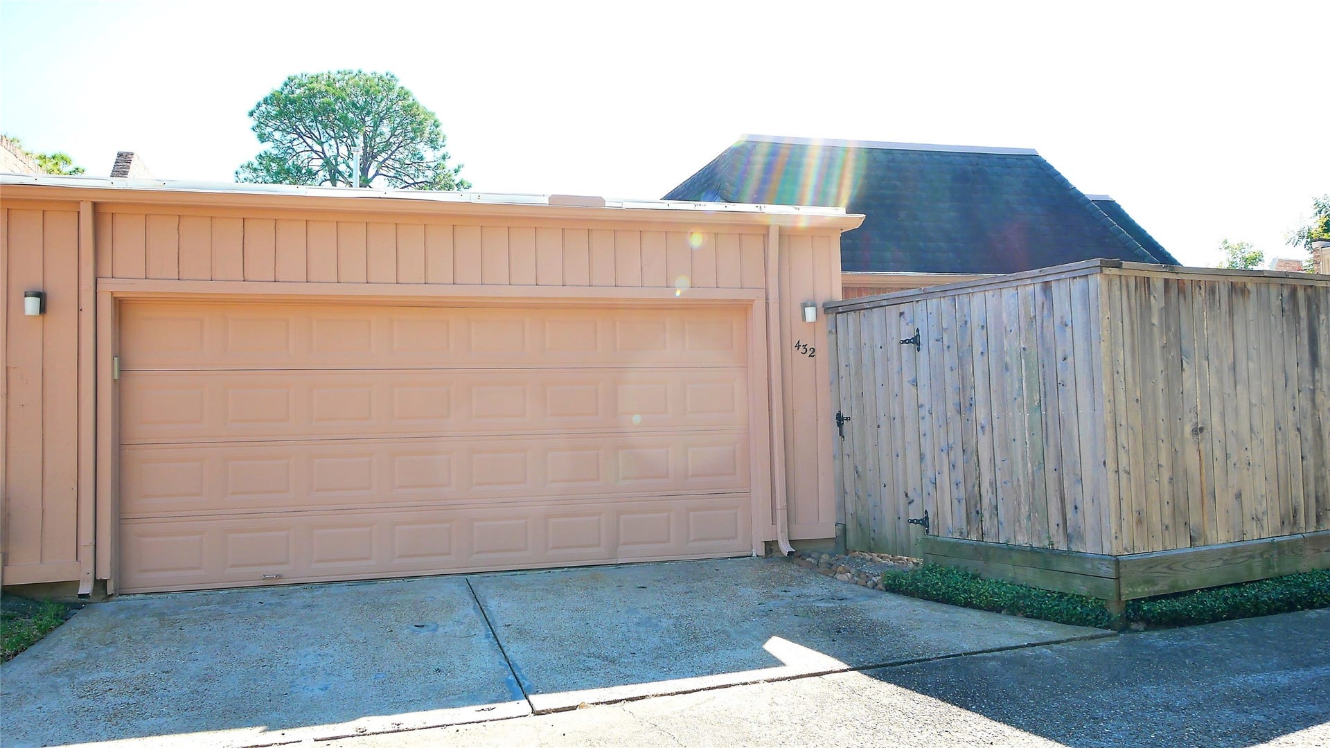 2 Car Garage and Entry Gate to Small yard Area