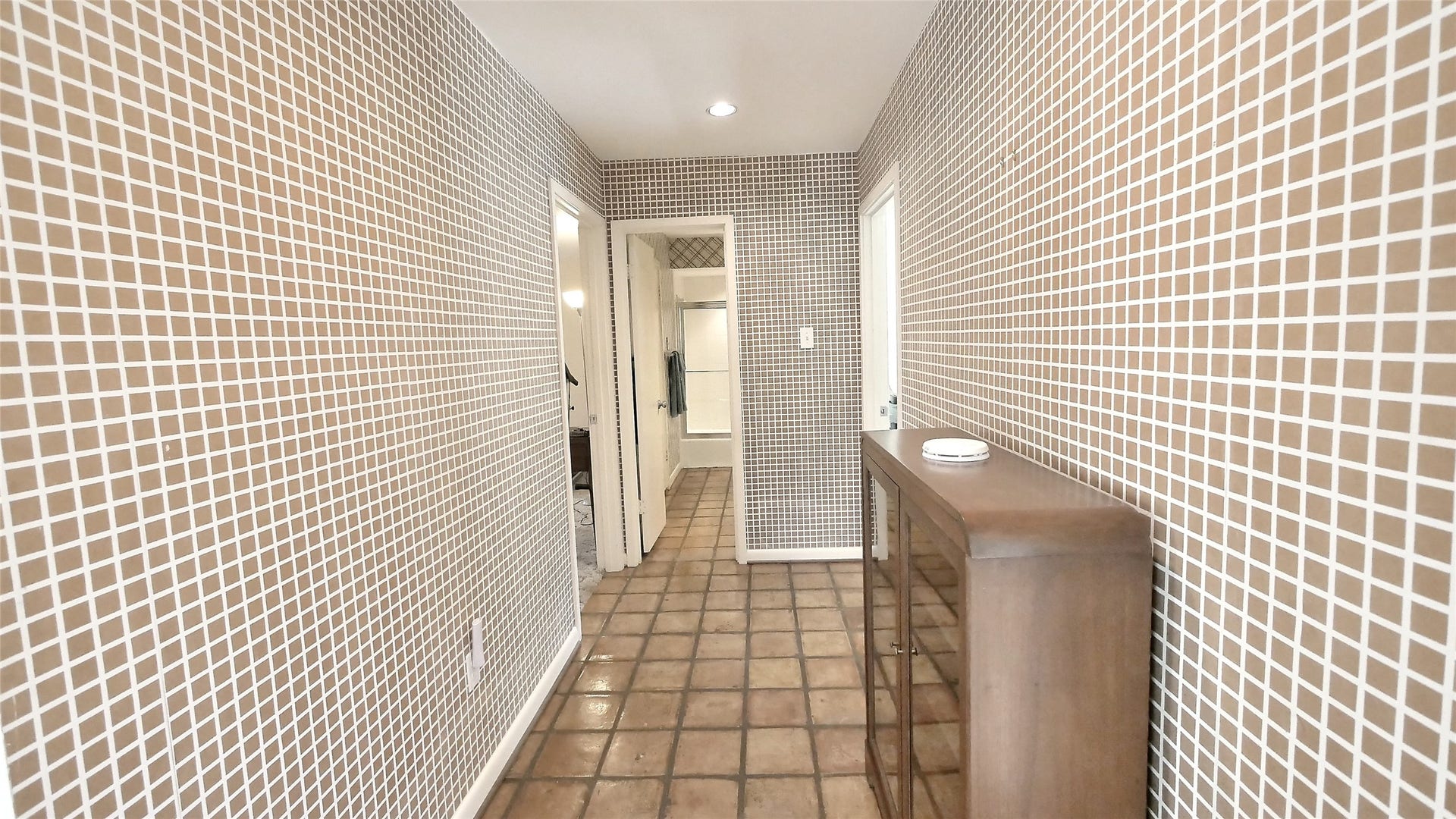 Hallway at the front of the house looking to the two bedrooms
