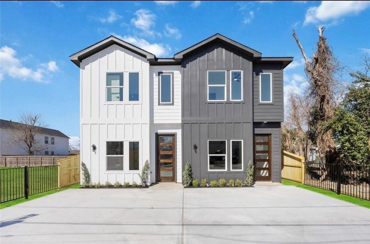 7920 Boy Street, #B, Houston, TX 77028 Beautiful two-story home featuring a modern exterior design, attractive curb appeal, and a spacious front lawn.