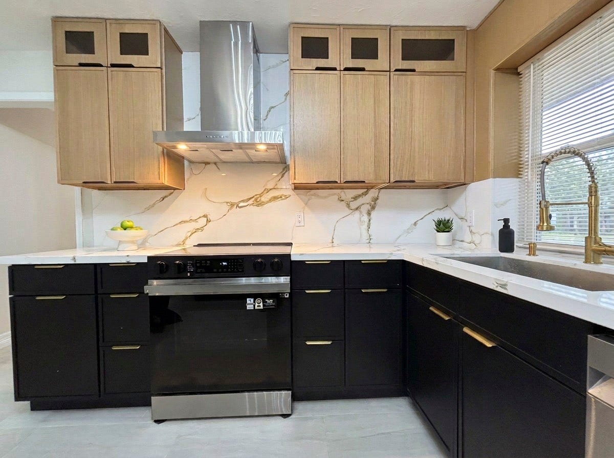 2106 Cherry Hills Drive, League City, TX 77573 New cabinets, quartz countertop, and matching backsplash.