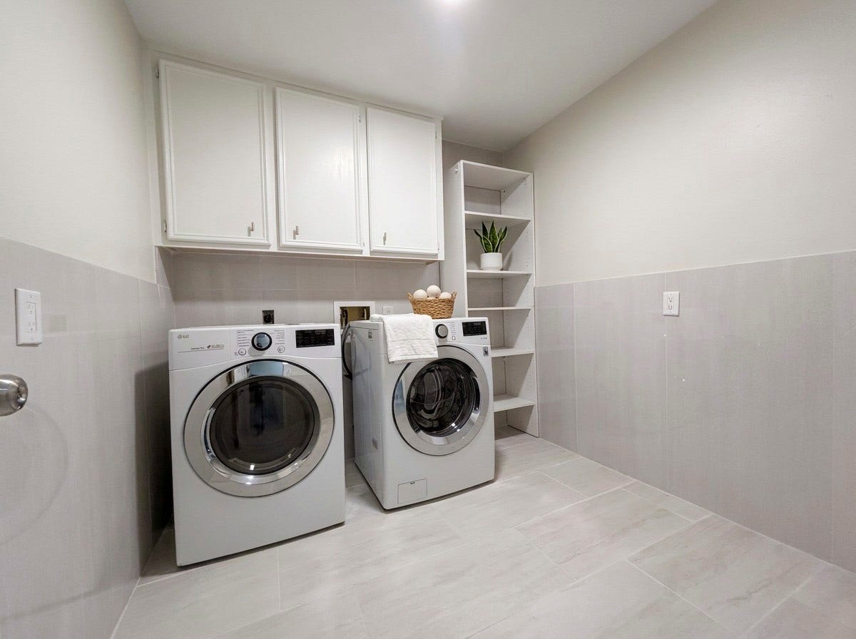 2106 Cherry Hills Drive, League City, TX 77573 Spacious Utility room on the first floor located near the kitchen with washer and dryer included.