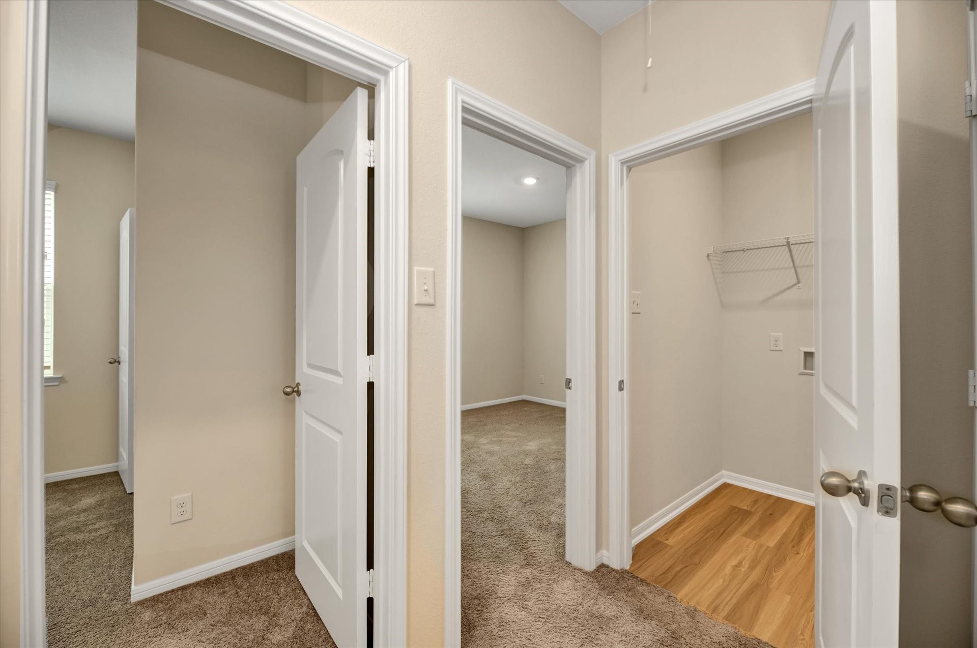 2136 Mule Ridge Drive, Katy, TX 77493 Two secondary bedrooms, laundry room and a linen closet next to it.