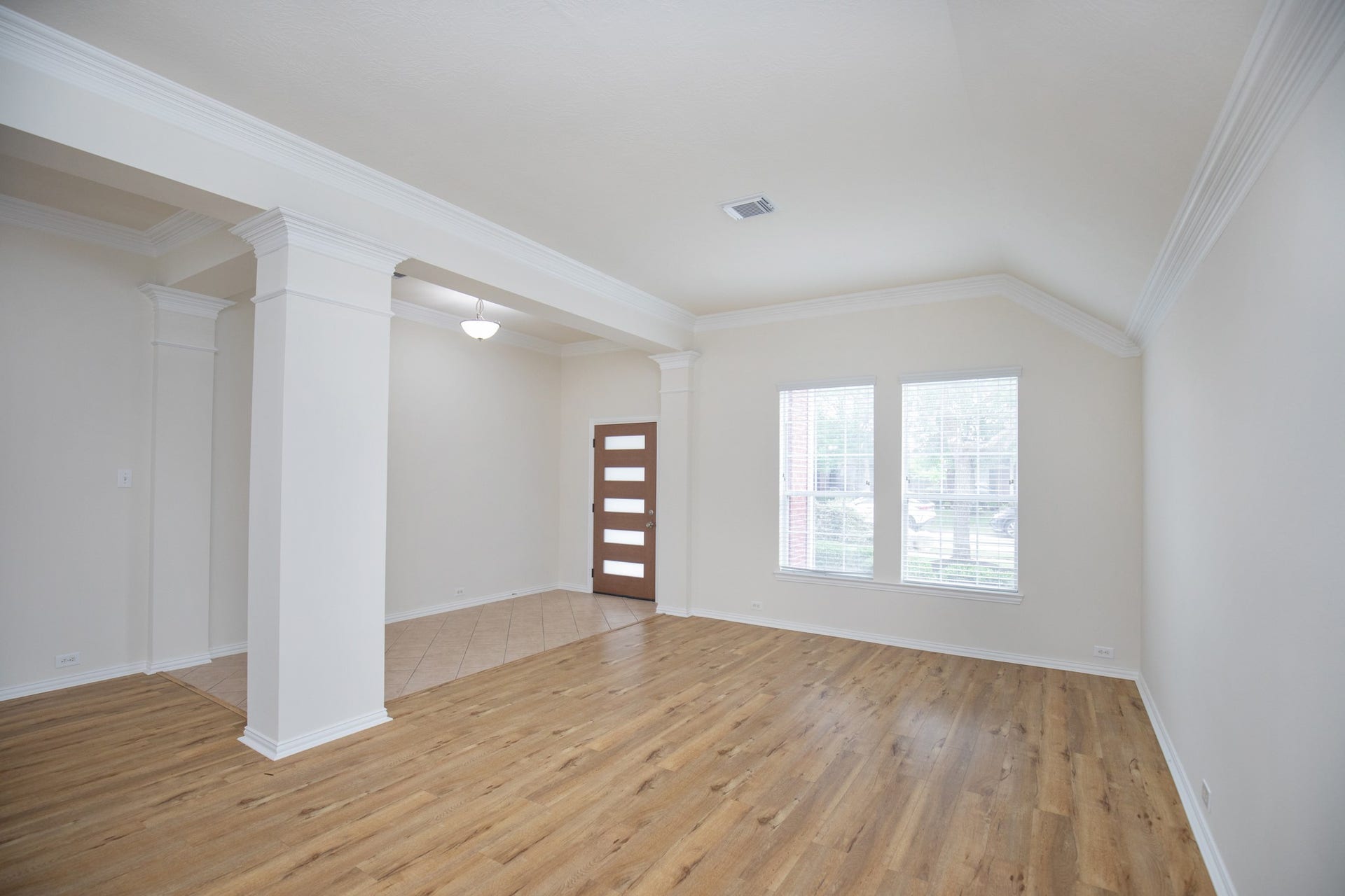 8802 Rocky Knoll Lane, Rosenberg, TX 77469 Formal dining and Formal living with updated floor