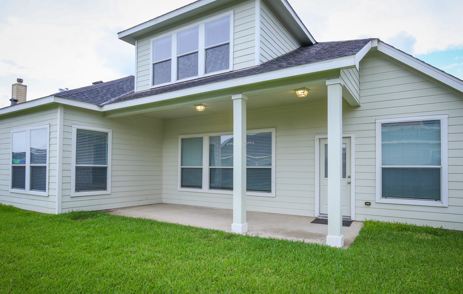 8802 Rocky Knoll Lane, Rosenberg, TX 77469 Backyard Spacious covered porch approx. 23X11 has lots potential; BBQ, pets house cages, even outdoor kitchen...