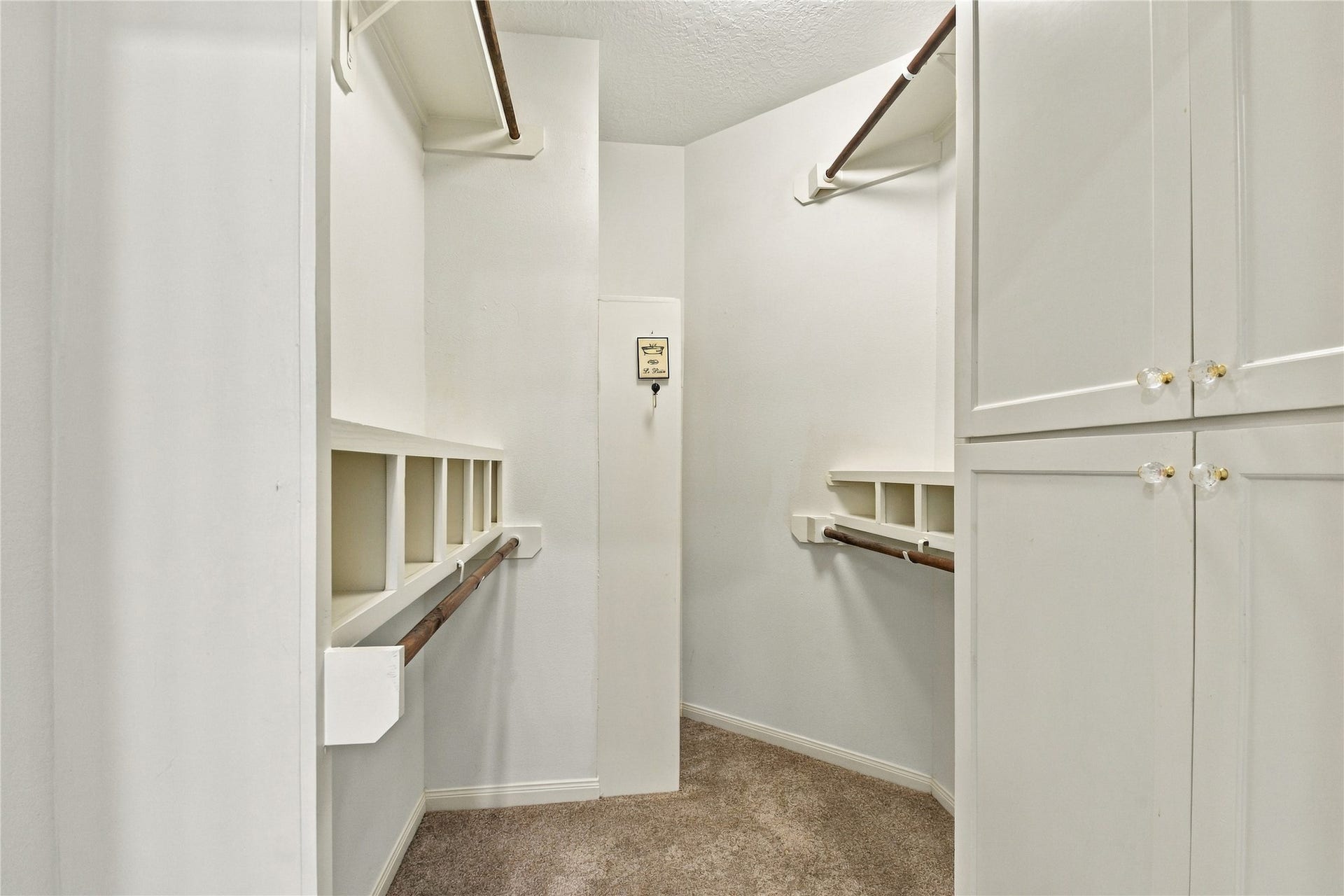 14515 Moss Creek Lane, Cypress, TX 77429 Custom closet in primary bathroom; one of two closets