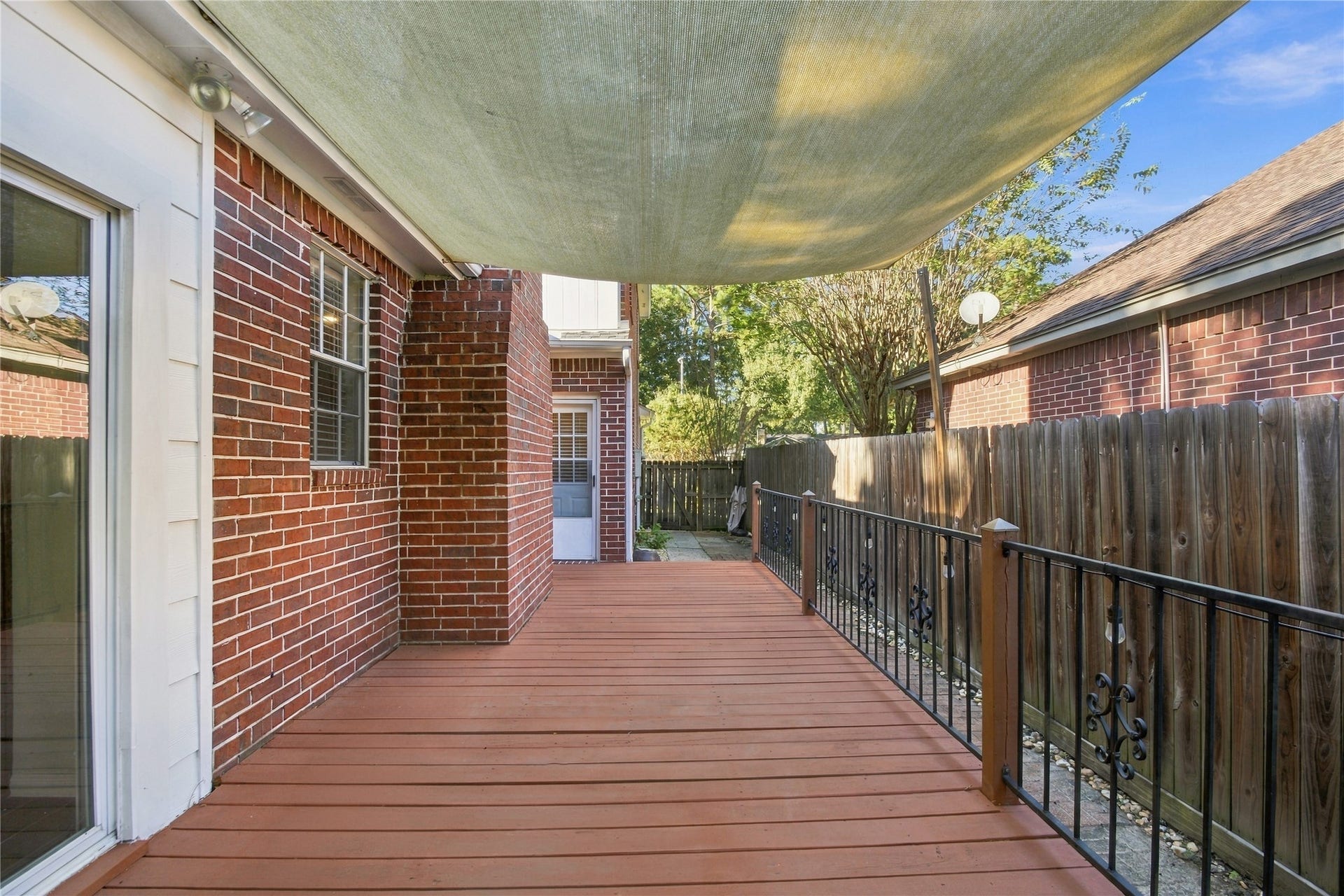 14515 Moss Creek Lane, Cypress, TX 77429 Deck off of breakfast room exit and game room exit