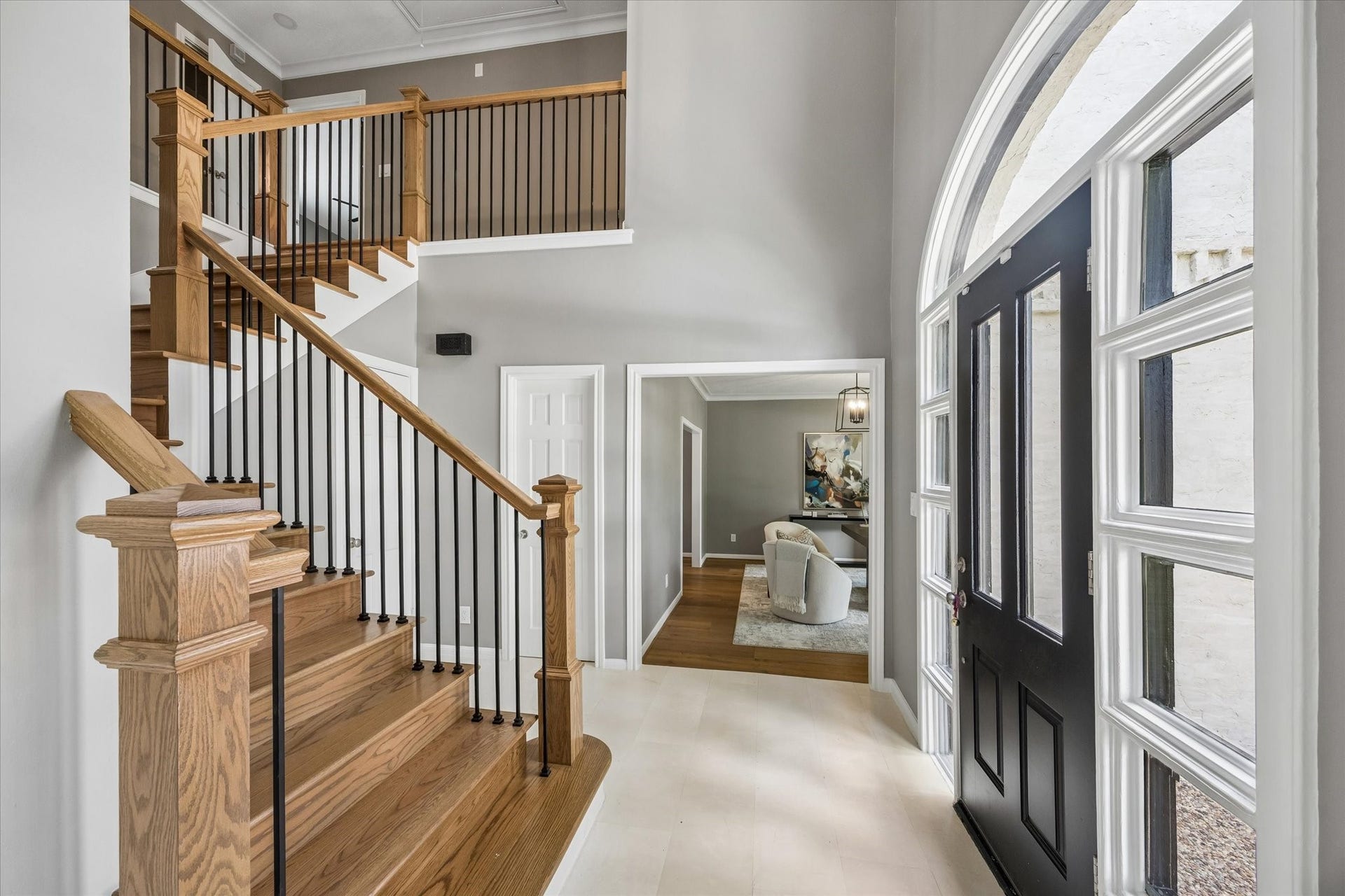 20111 Hardwidge Court, Katy, TX 77450 Stunning entryway with custom staircase, new entry tile and all new paint!