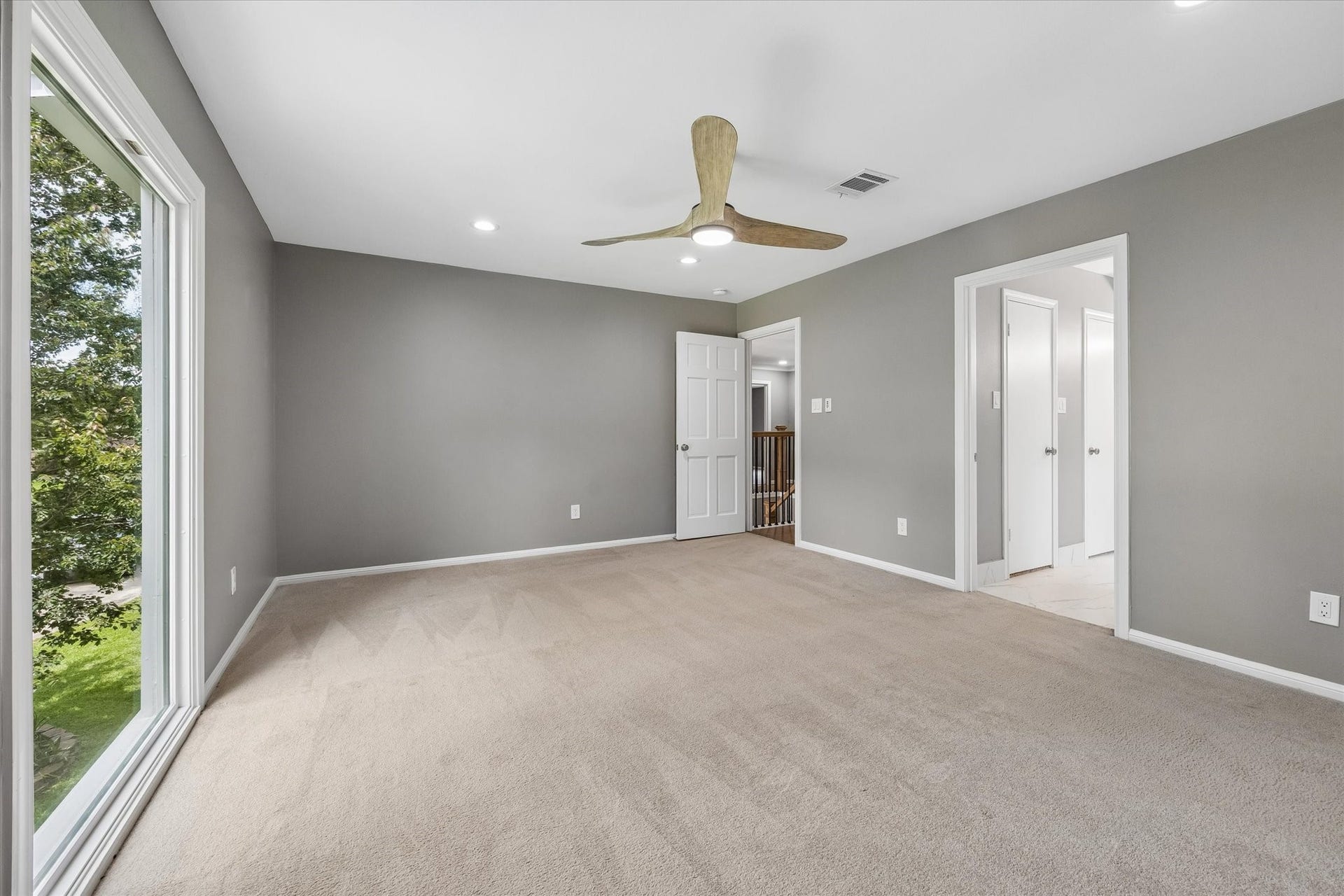 20111 Hardwidge Court, Katy, TX 77450 PRIMARY BEDROOM - New fan, new paint, beautiful windows and so much space!