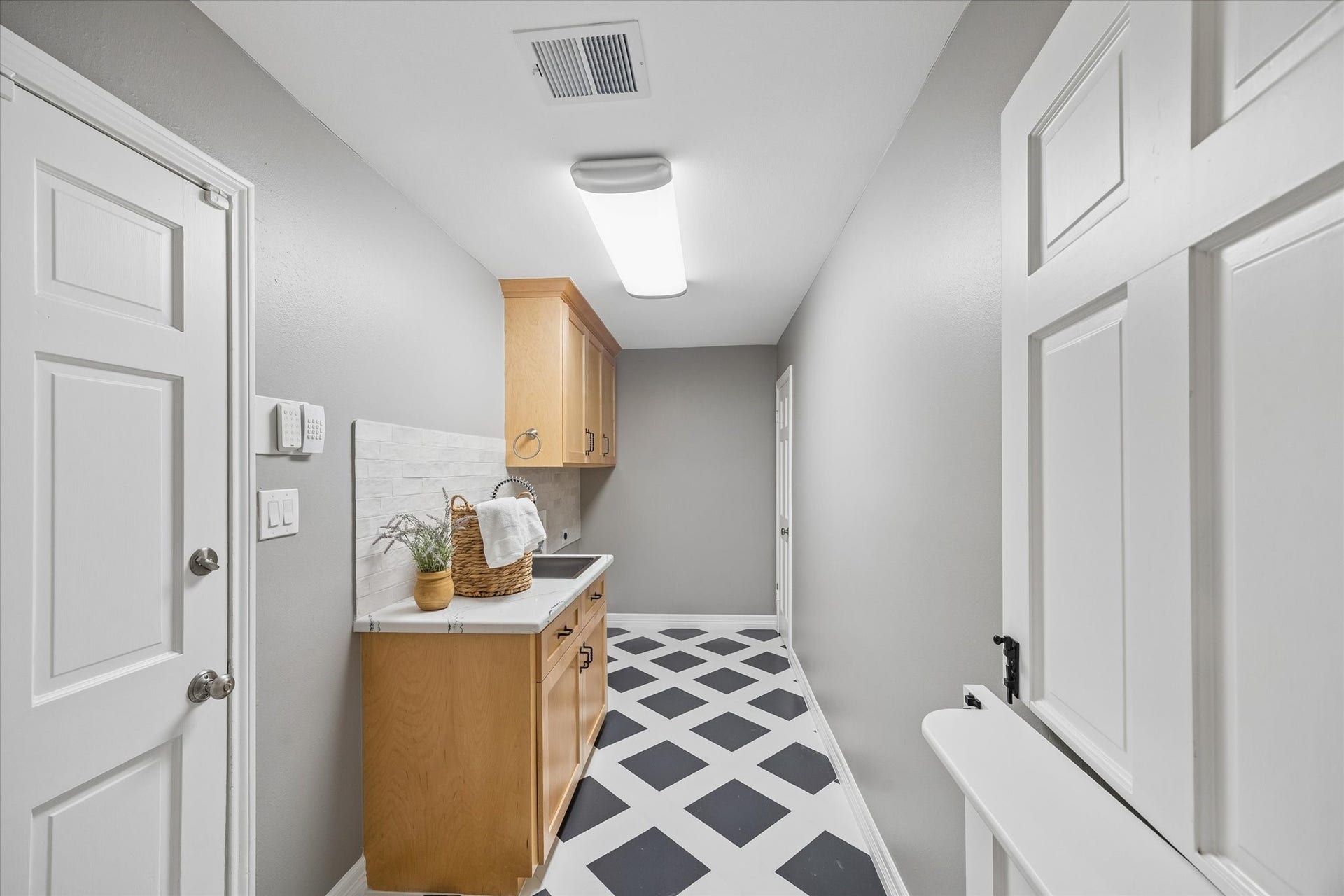 20111 Hardwidge Court, Katy, TX 77450 MASSIVE Laundry room with extra SINK! Also in the back there is a secondary half bathroom.