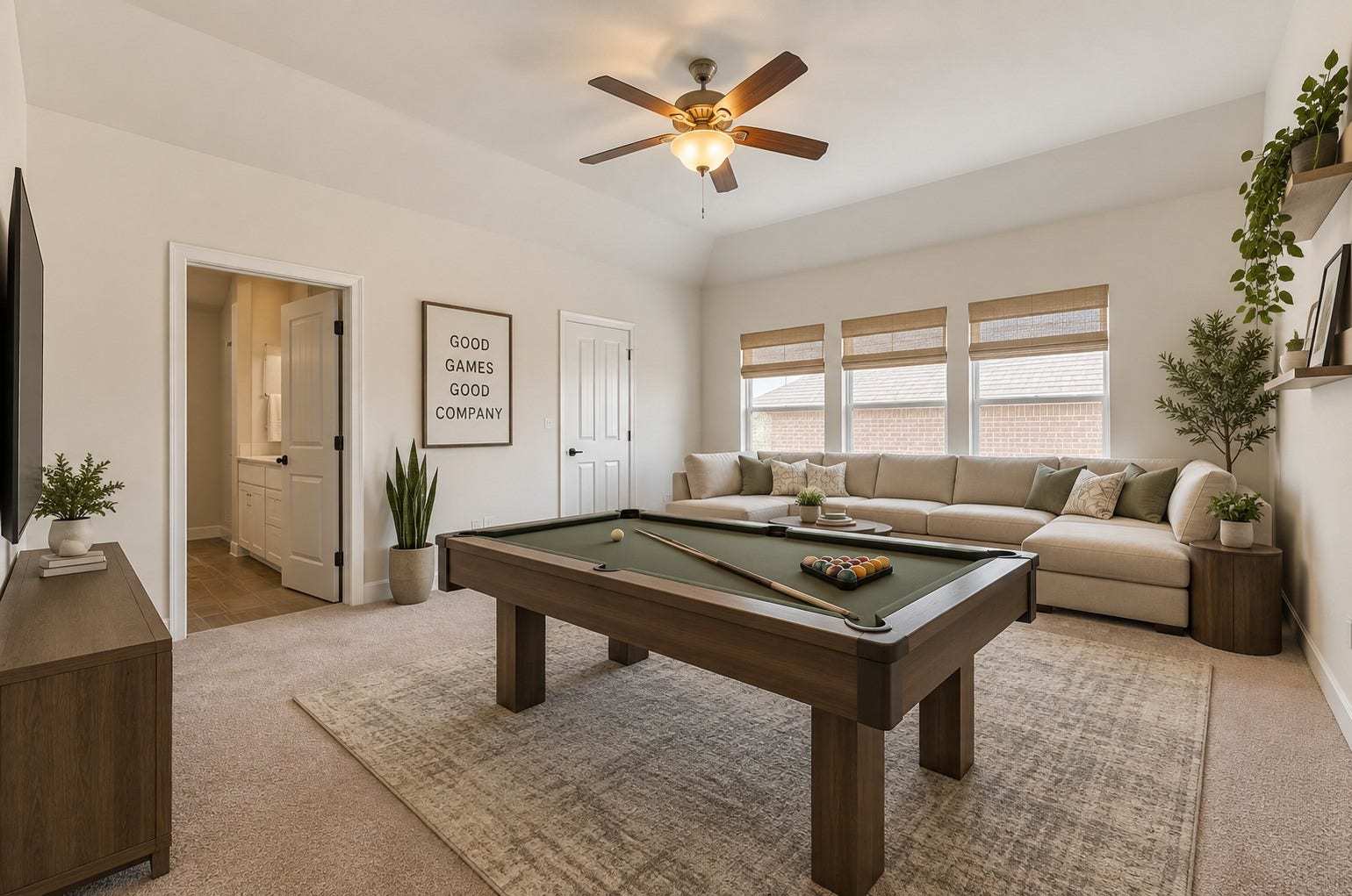 Game nights just got better! This spacious upstairs game room offers an exciting space for entertaining, friendly competition, and memorable times with family and friends. Virtually staged.