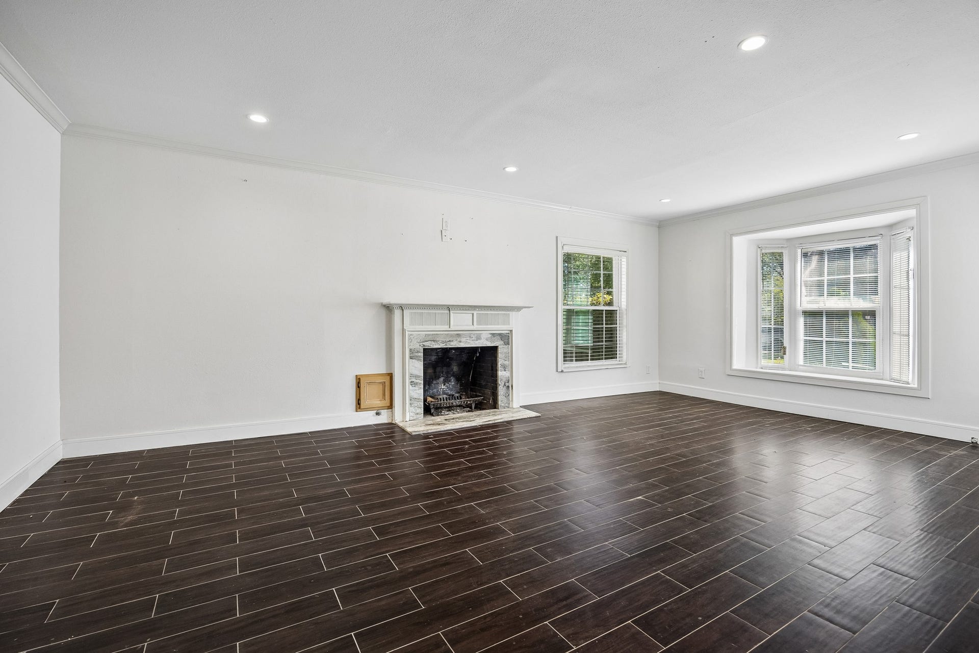 4431 N Roseneath Drive, Houston, TX 77021 Formal living room with fireplace.