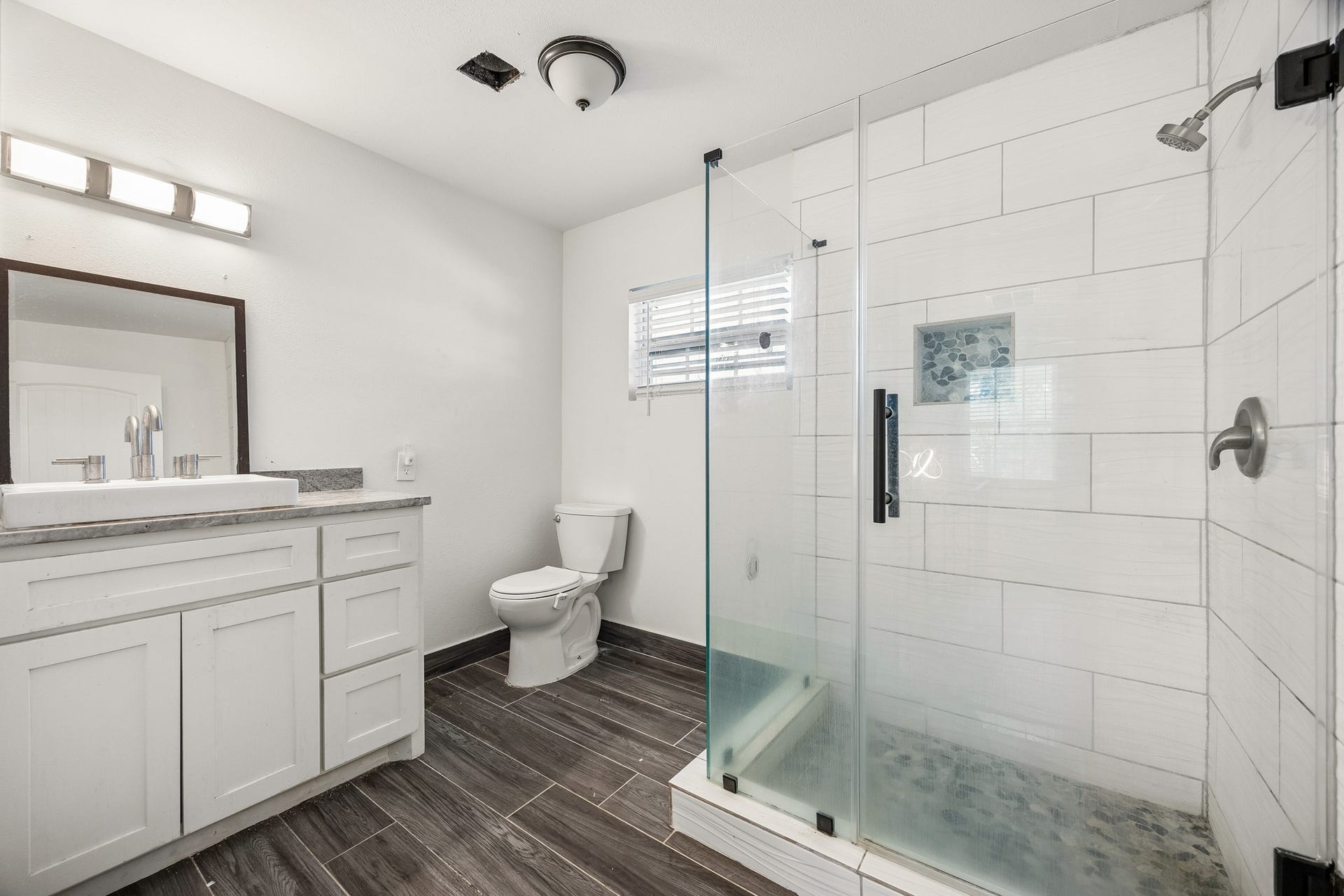 4431 N Roseneath Drive, Houston, TX 77021 Bath #3 - offers a frameless en-closed walk-in shower.