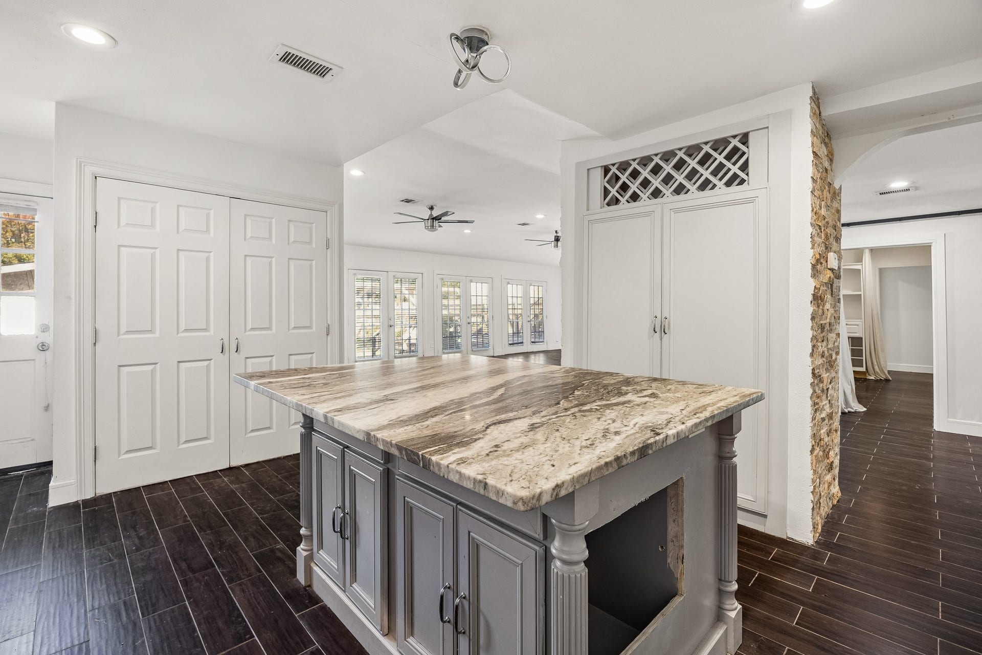 4431 N Roseneath Drive, Houston, TX 77021 Island with seating overlooking the family room.