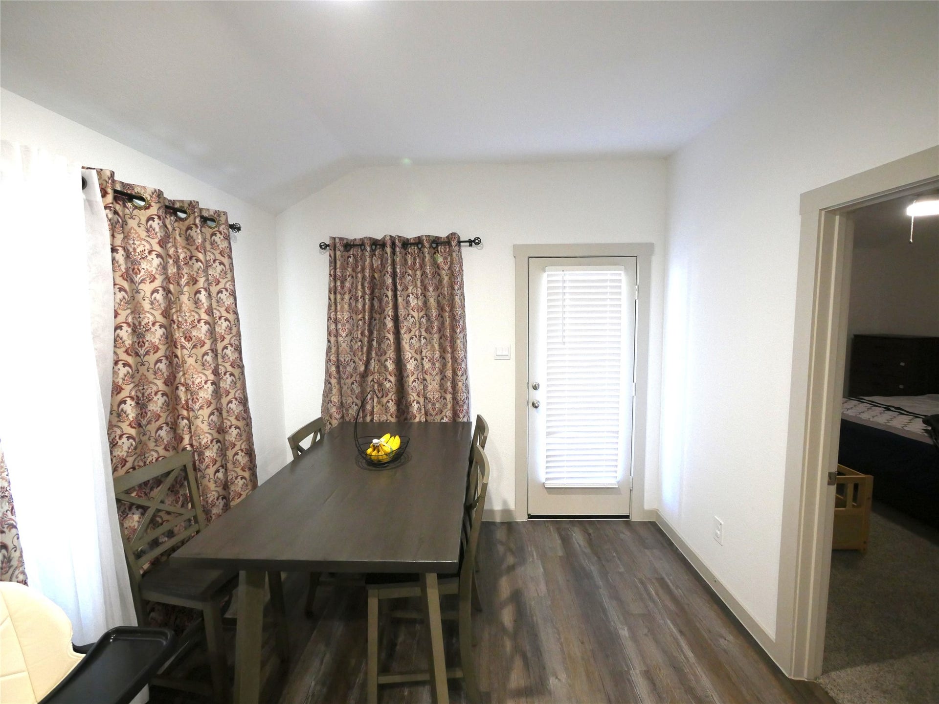 Bright dining area seamlessly connects with the kitchen and living spaces, creating an inviting setting for everyday meals and entertaining.