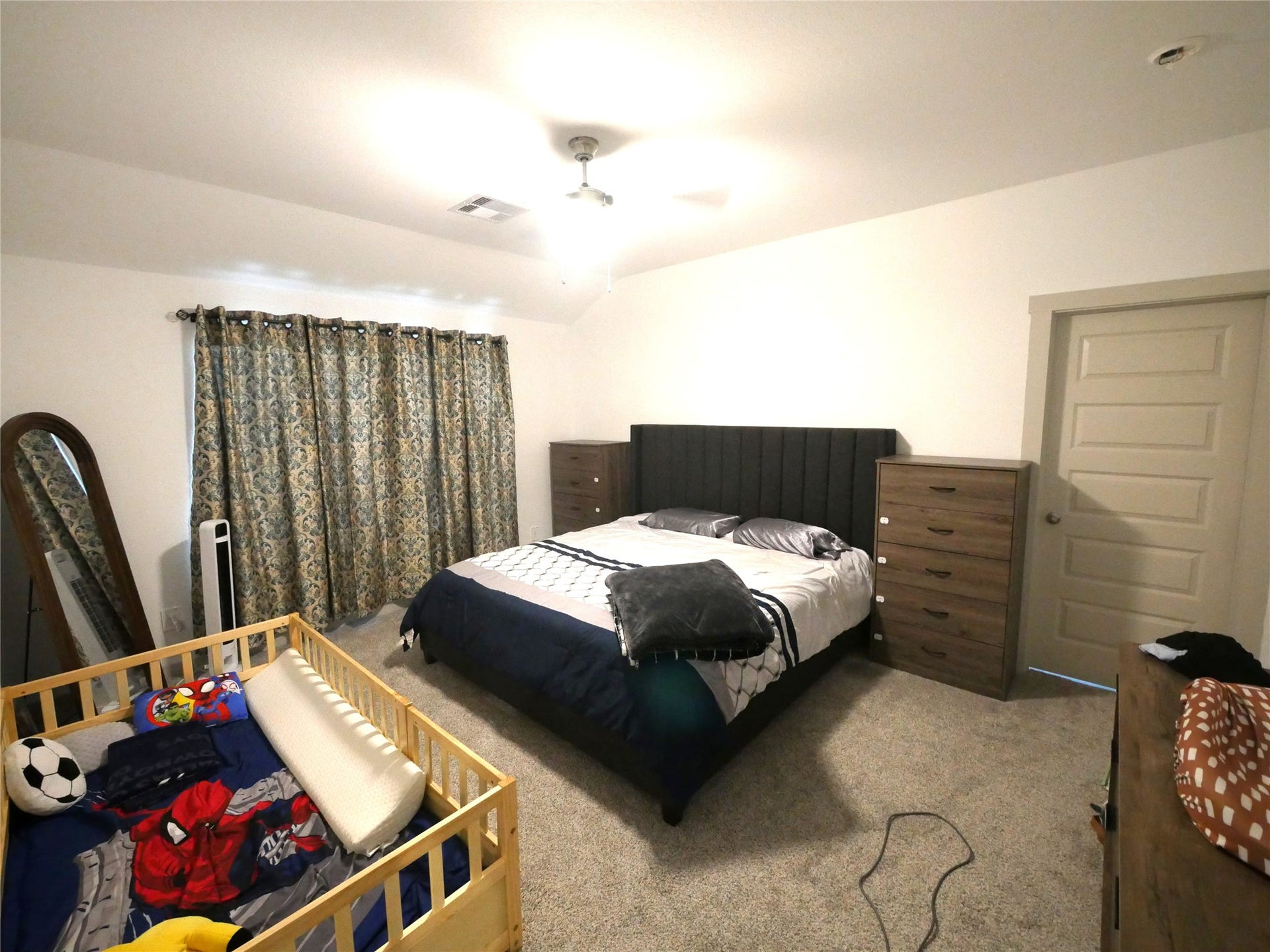 Spacious primary retreat offering a comfortable layout, natural light, and a relaxing setting with easy access to the ensuite bath.