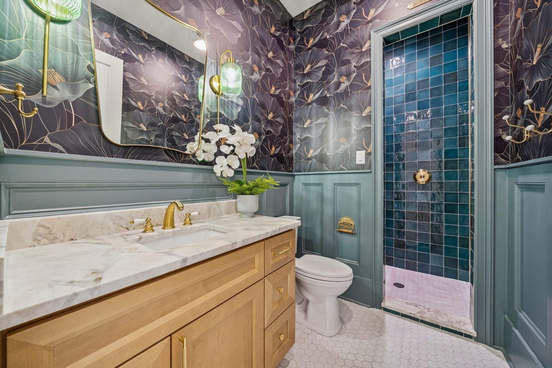 The most gorgeous guest bathroom next to the foyer. That green tile is perfection.
