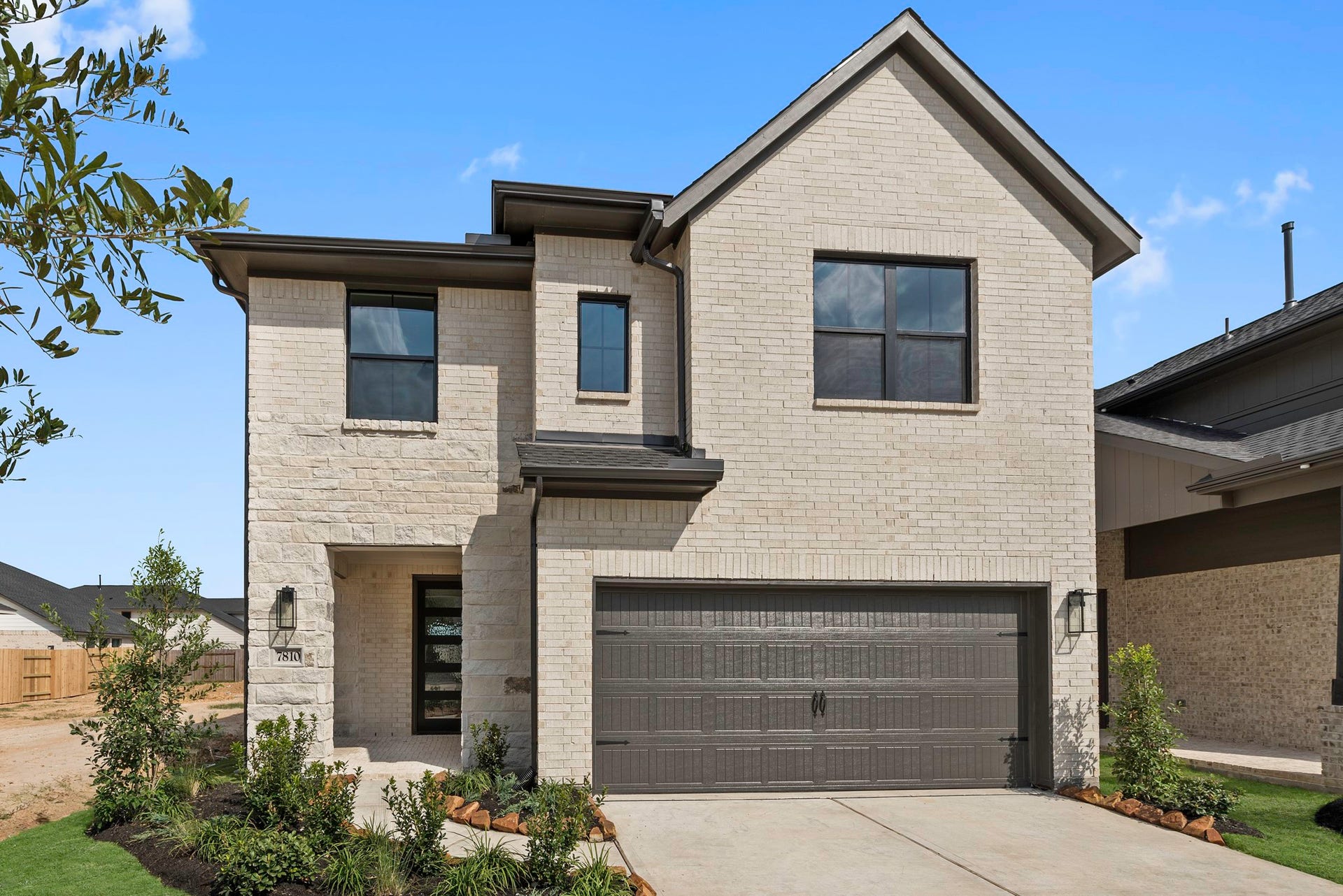 7810 Clover Gully Lane, Katy, TX 77493 Move in Ready. Westin Homes *New Construction* Dominion Plan. Grass is digitally enhanced.