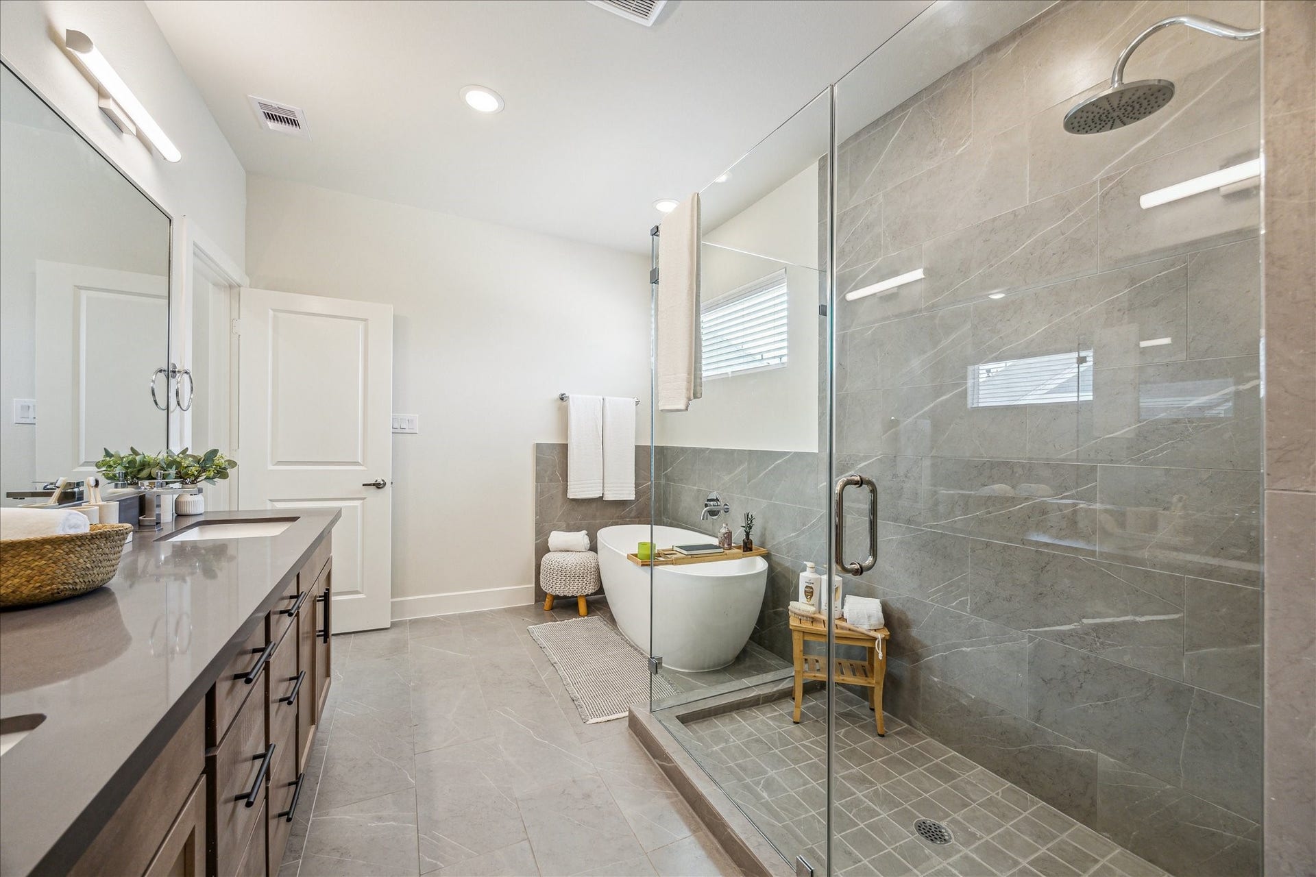24405 Colonial Mound Drive, Katy, TX 77493 Representative photo showing the communitys model home primary bathroom. Layout and selections may vary.