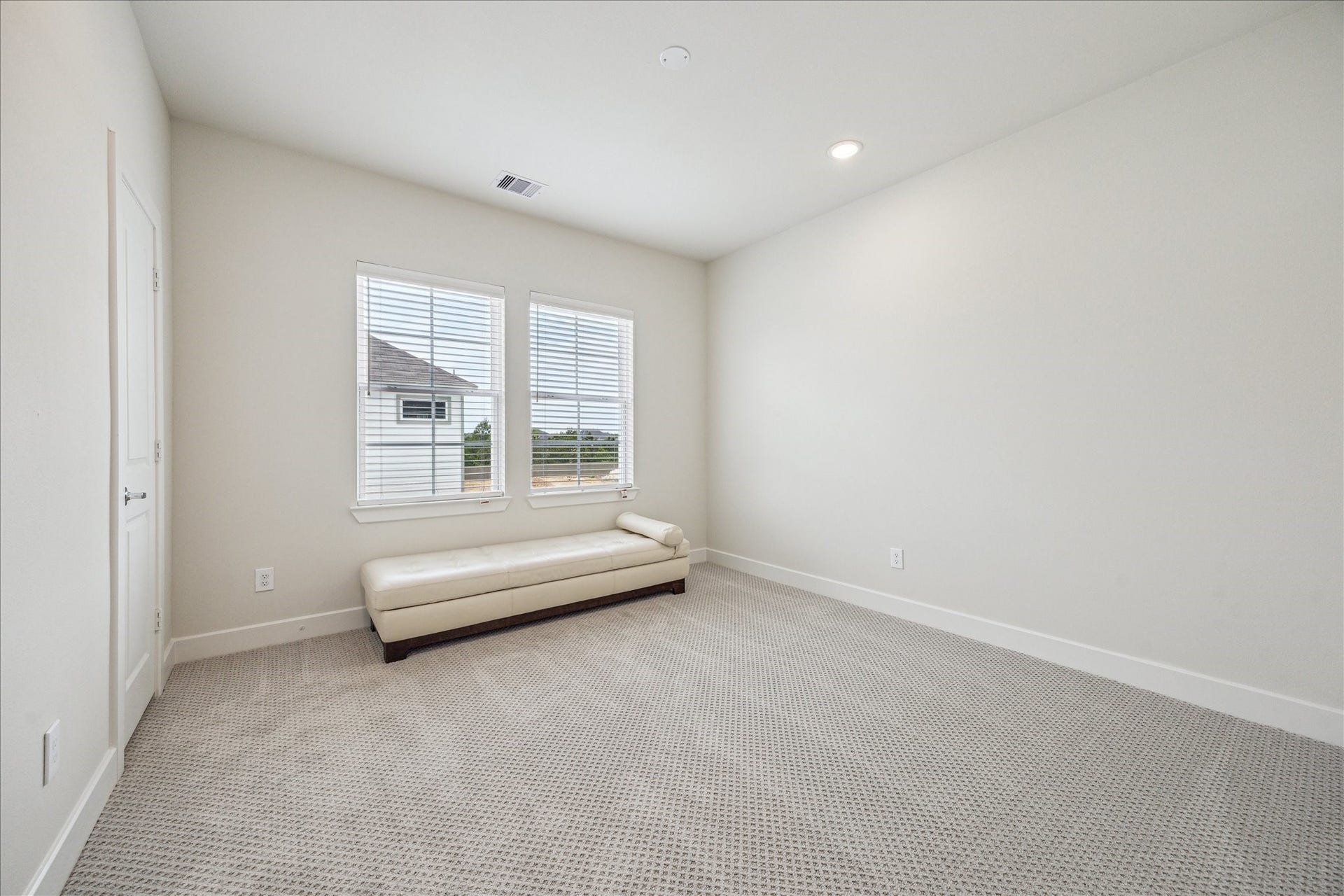 24405 Colonial Mound Drive, Katy, TX 77493 Representative photo showing the communitys model home secondary bedroom. Layout and selections may vary.