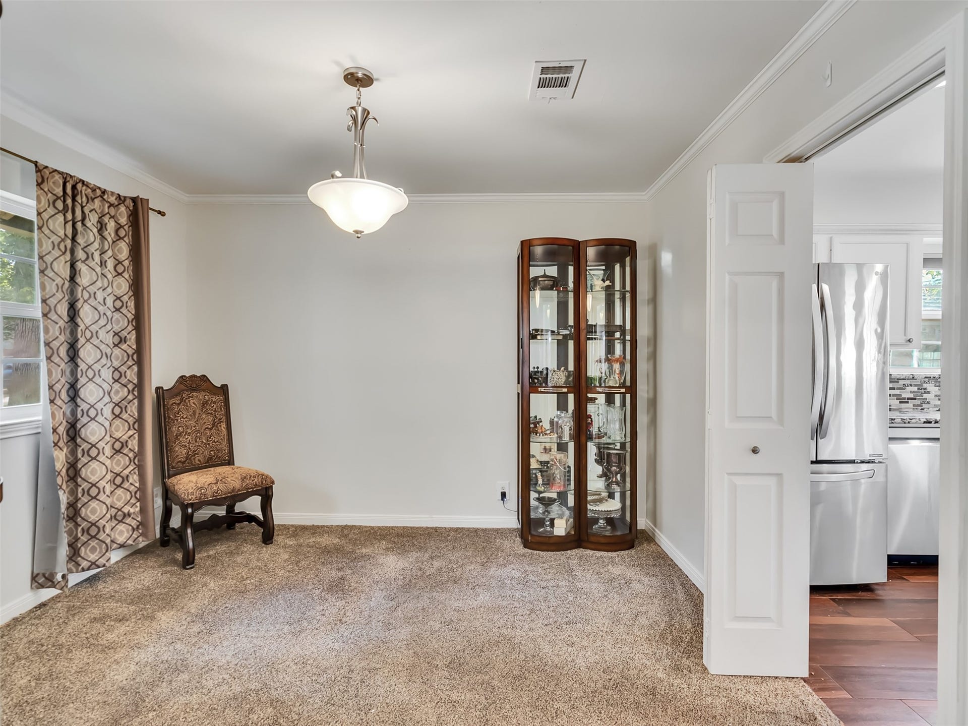 3017 Inwood Drive, Dickinson, TX 77539 Formal dining room makes a great office space. A formal living room not pictured makes a large formal dining room.