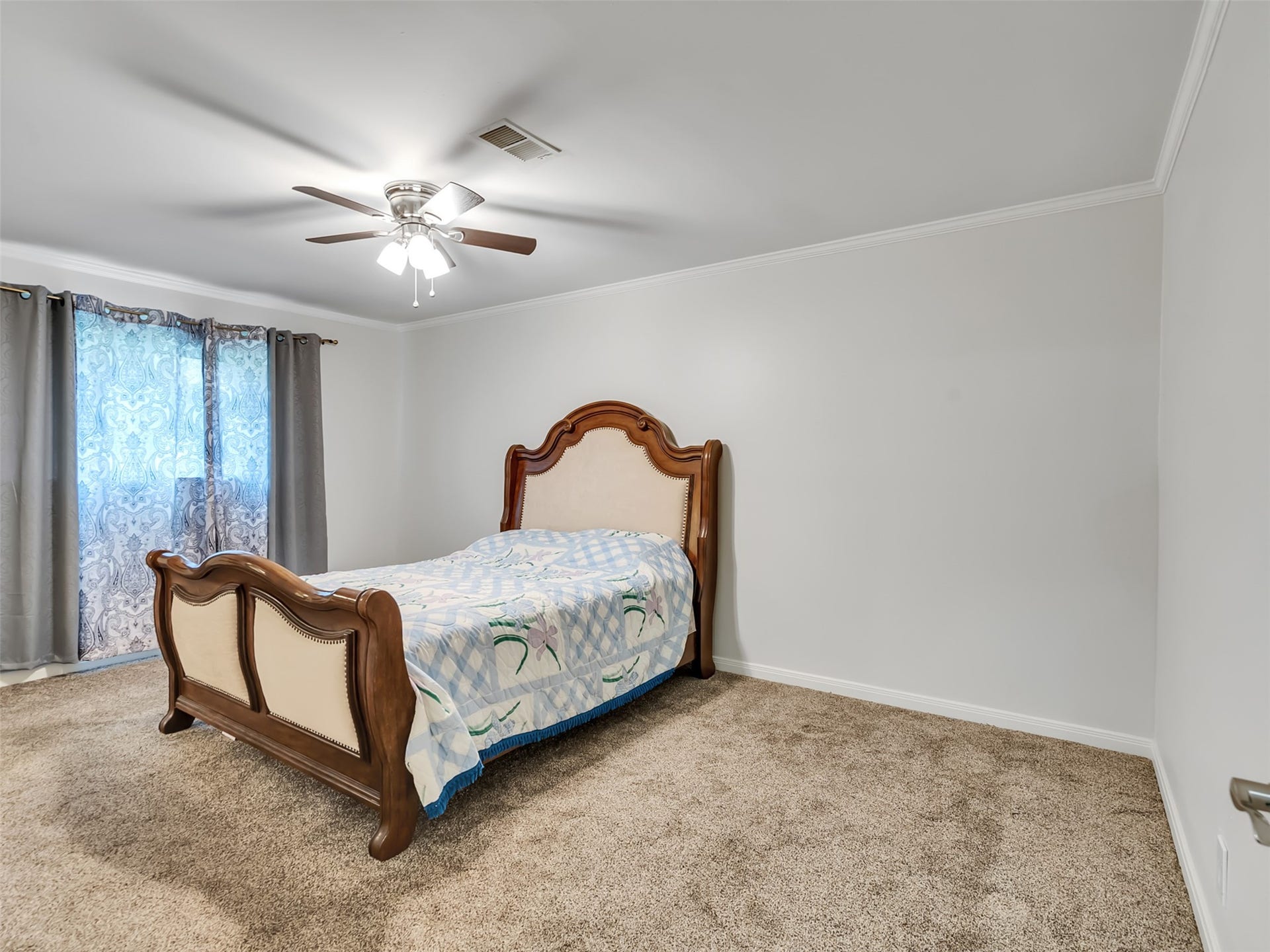 3017 Inwood Drive, Dickinson, TX 77539 The spacious primary bedroom also located downstairs.