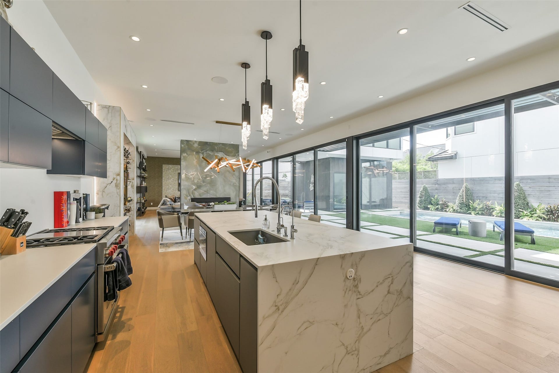 3003 Virginia Street, Houston, TX 77098 Wonderful open kitchen with large island overlooking pool.