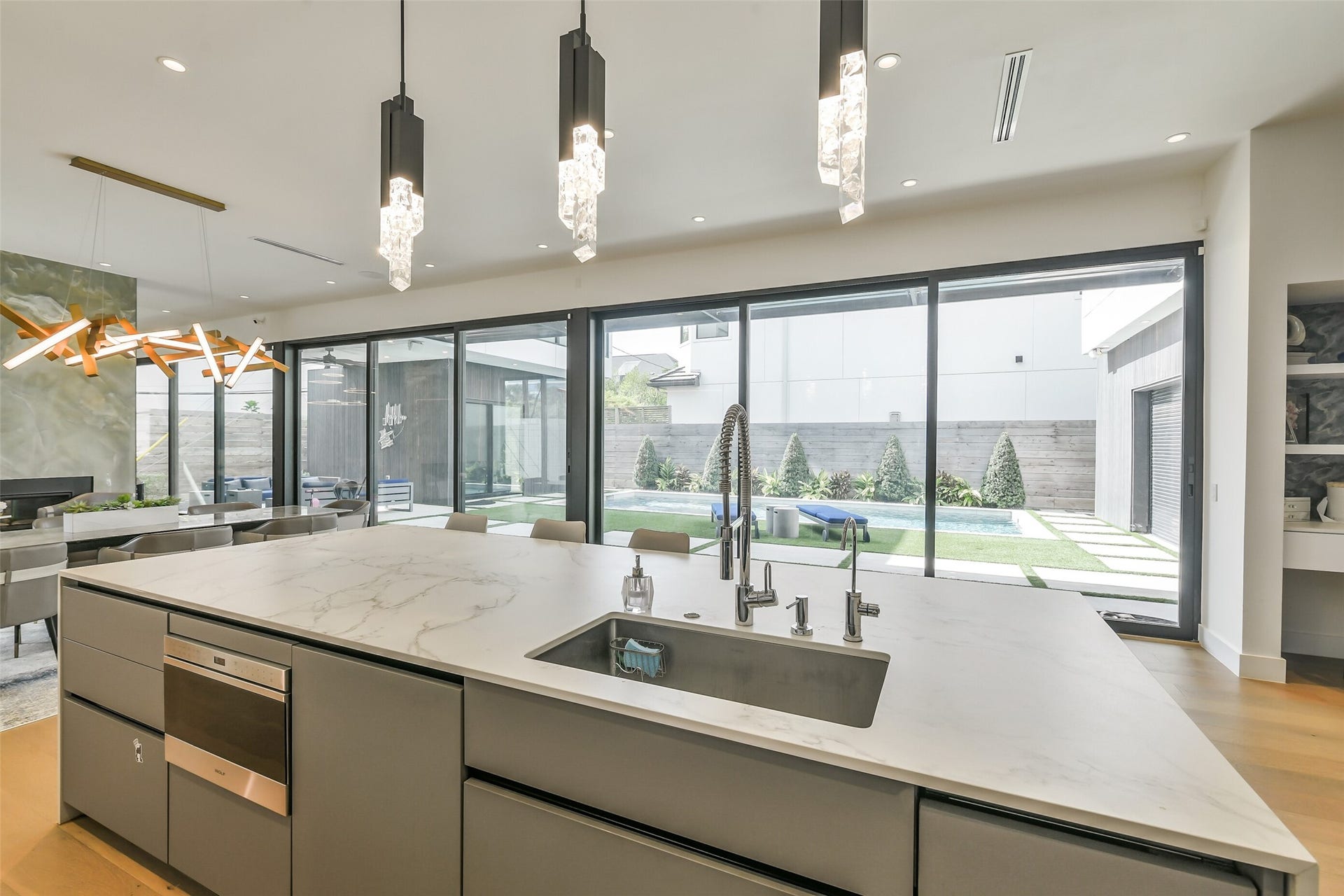 3003 Virginia Street, Houston, TX 77098 Wonderful open kitchen with large island overlooking pool.