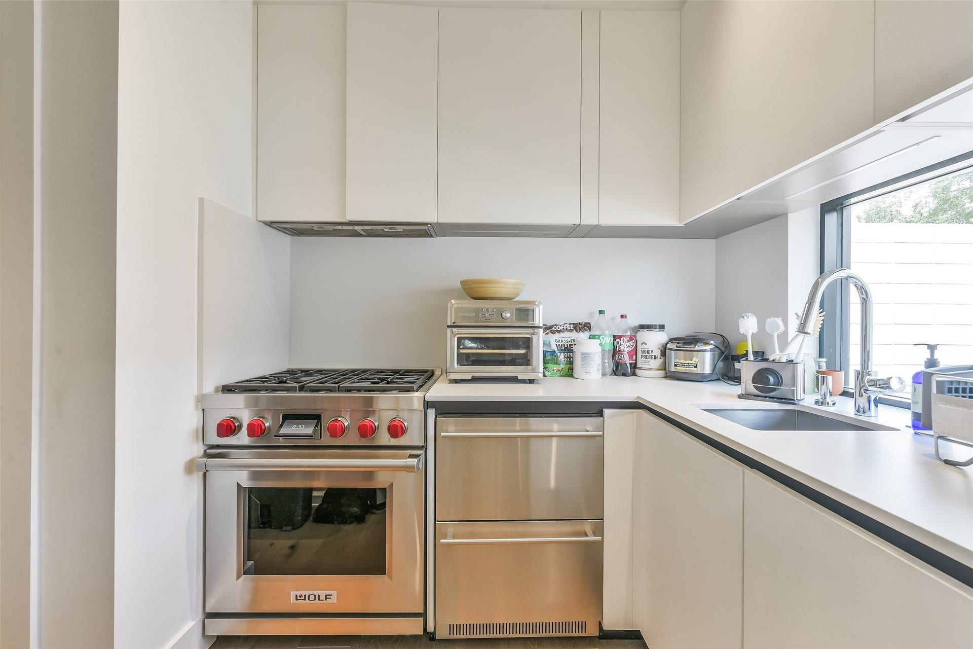 3003 Virginia Street, Houston, TX 77098 Secondary kitchen with closet prepared for elevator.