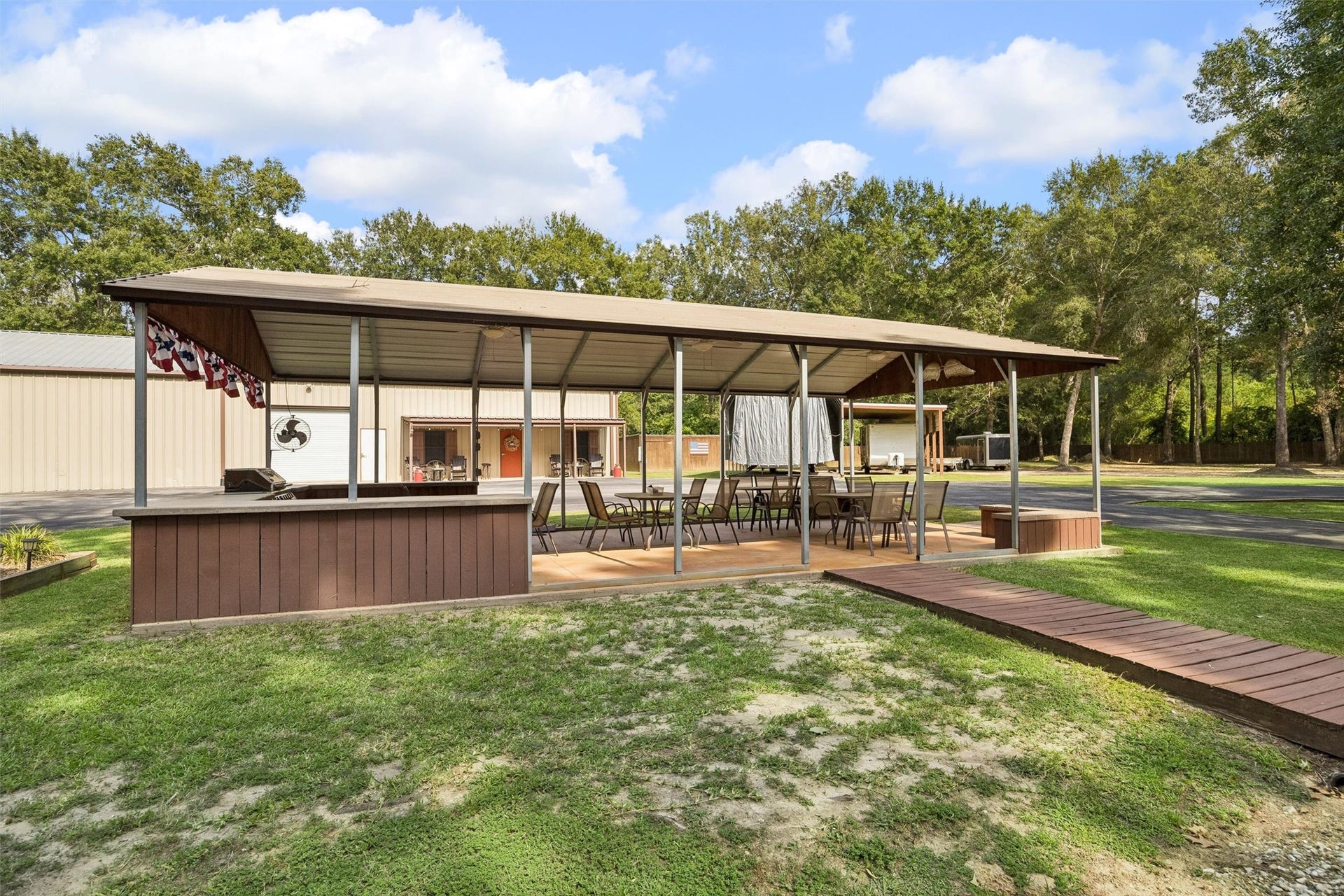 Outdoor pavilion with built in grill