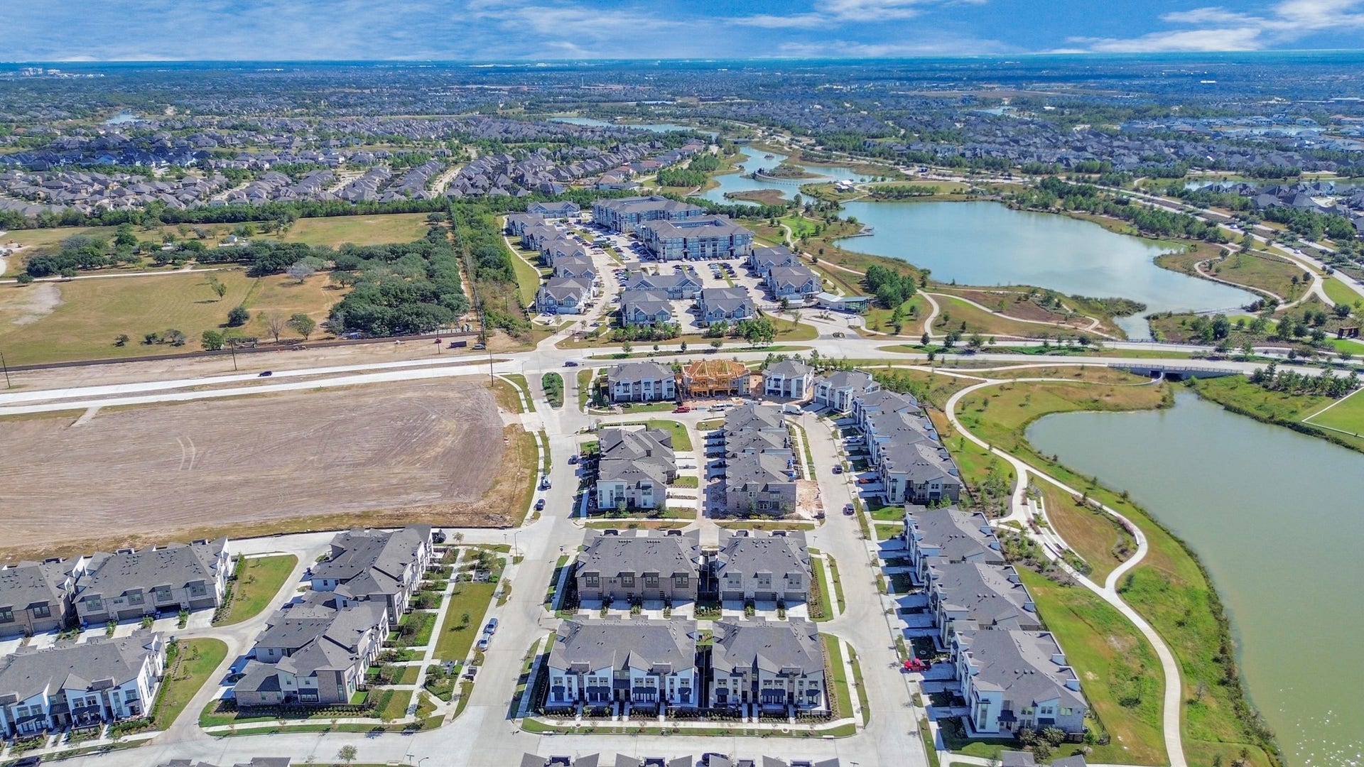 16506 Texas Hill Country Rd, Cypress, TX 77433 The aerial view shows the townhomes' prime location within the community