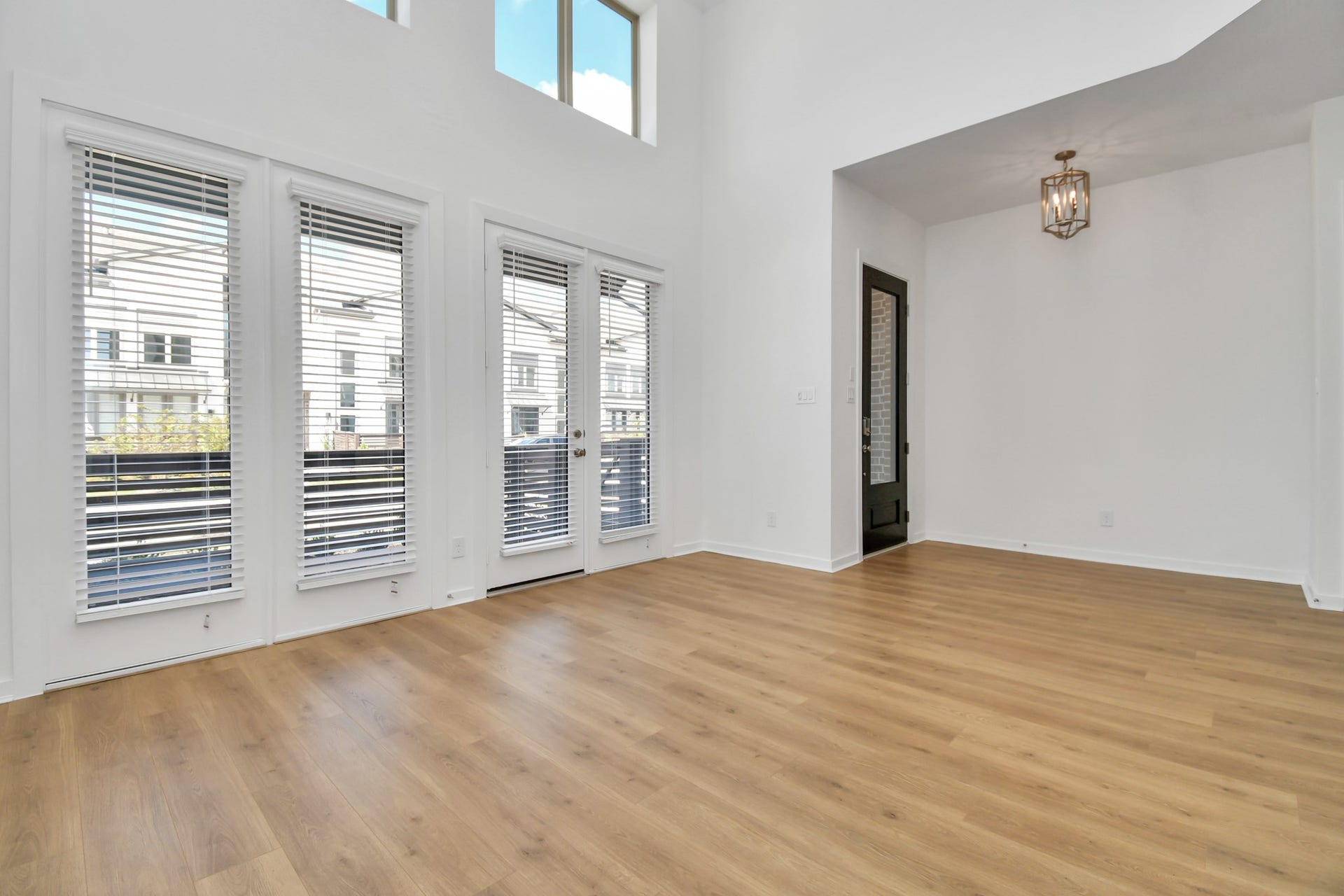 16506 Texas Hill Country Rd, Cypress, TX 77433 The front entry opens directly into a bright, inviting living room, seamlessly blending indoor comfort with a welcoming atmosphere.