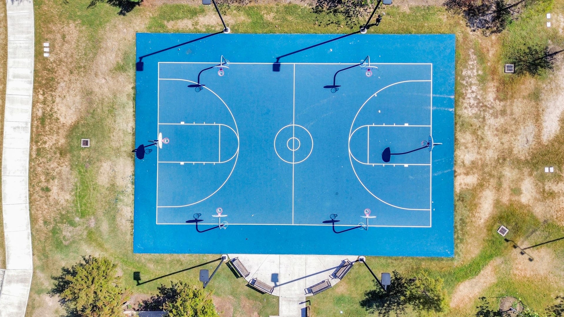 16506 Texas Hill Country Rd, Cypress, TX 77433 The community basketball court offers a vibrant space for residents to enjoy friendly games and exercise in a welcoming environment.